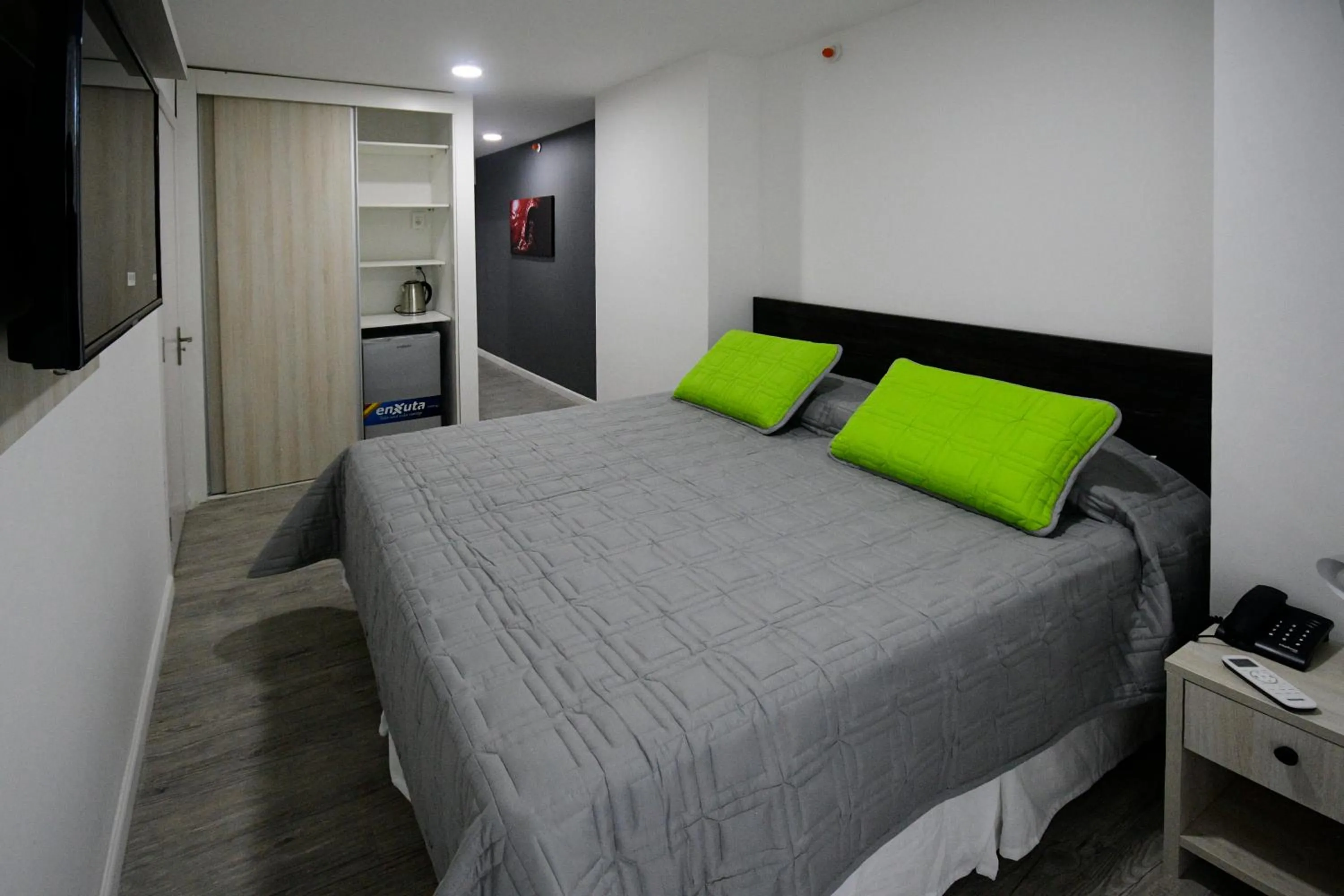 Bed in Quijano Hotel - Aparts & Suites