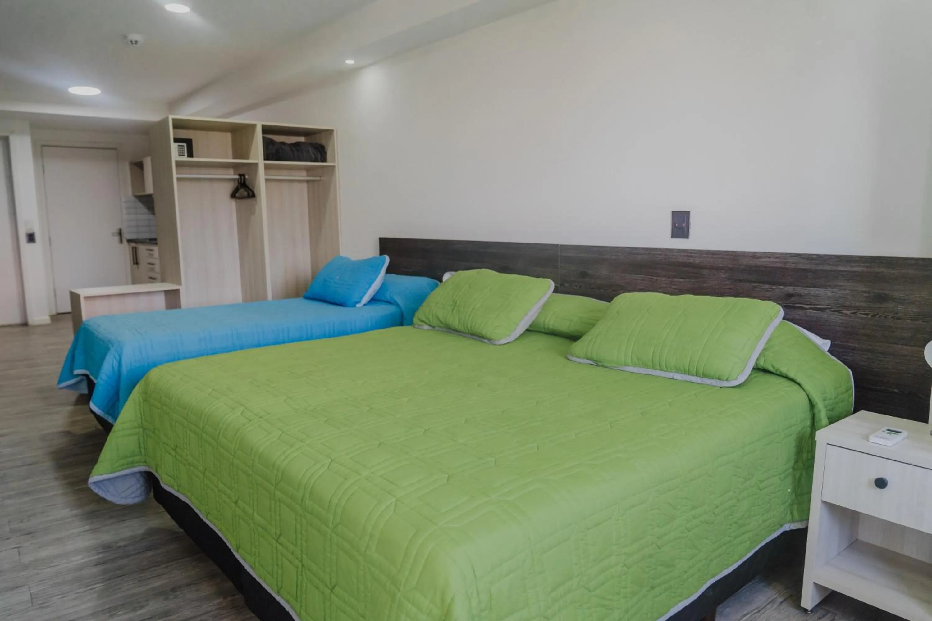 Bed in Quijano Hotel - Aparts & Suites