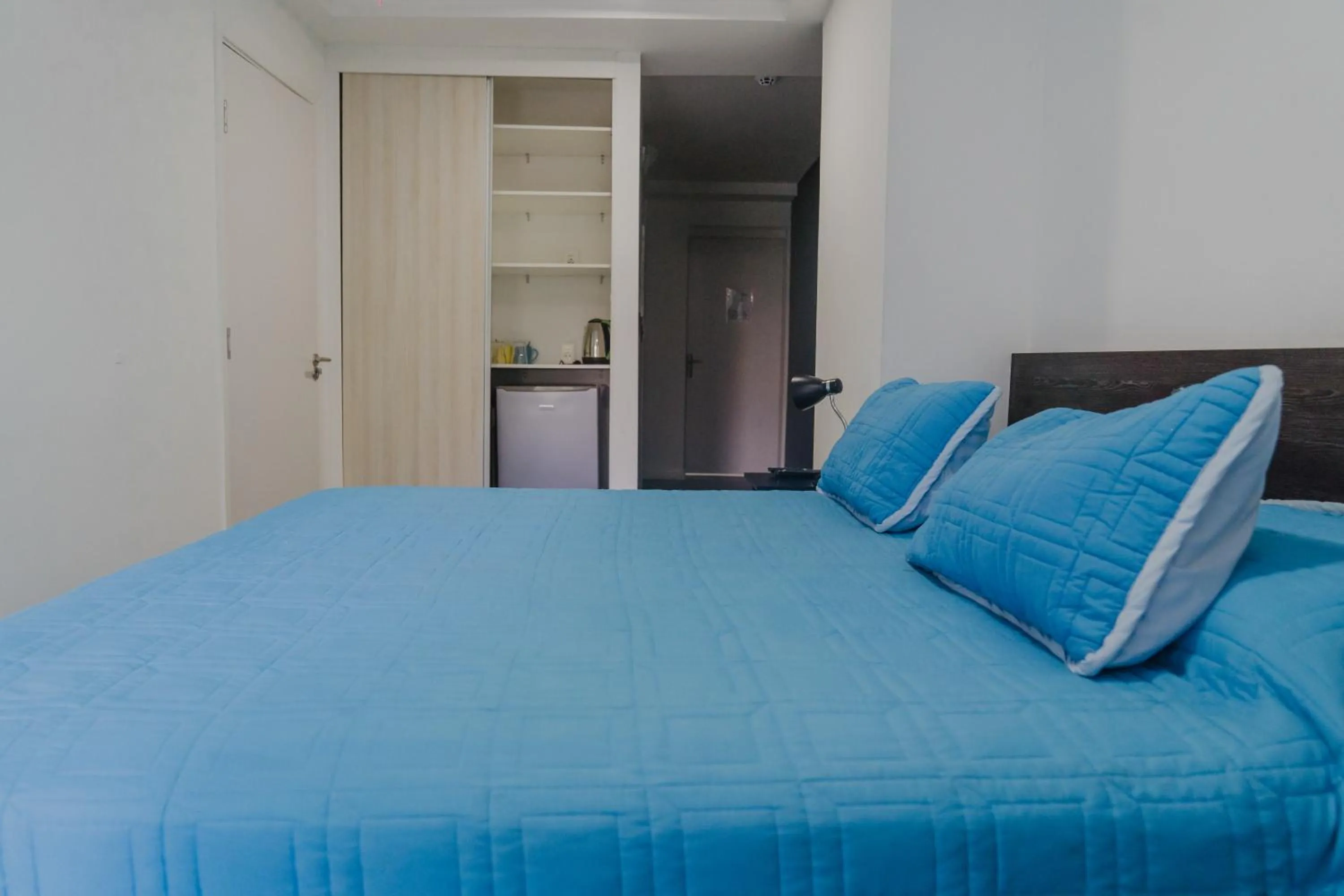 Bed in Quijano Hotel - Aparts & Suites