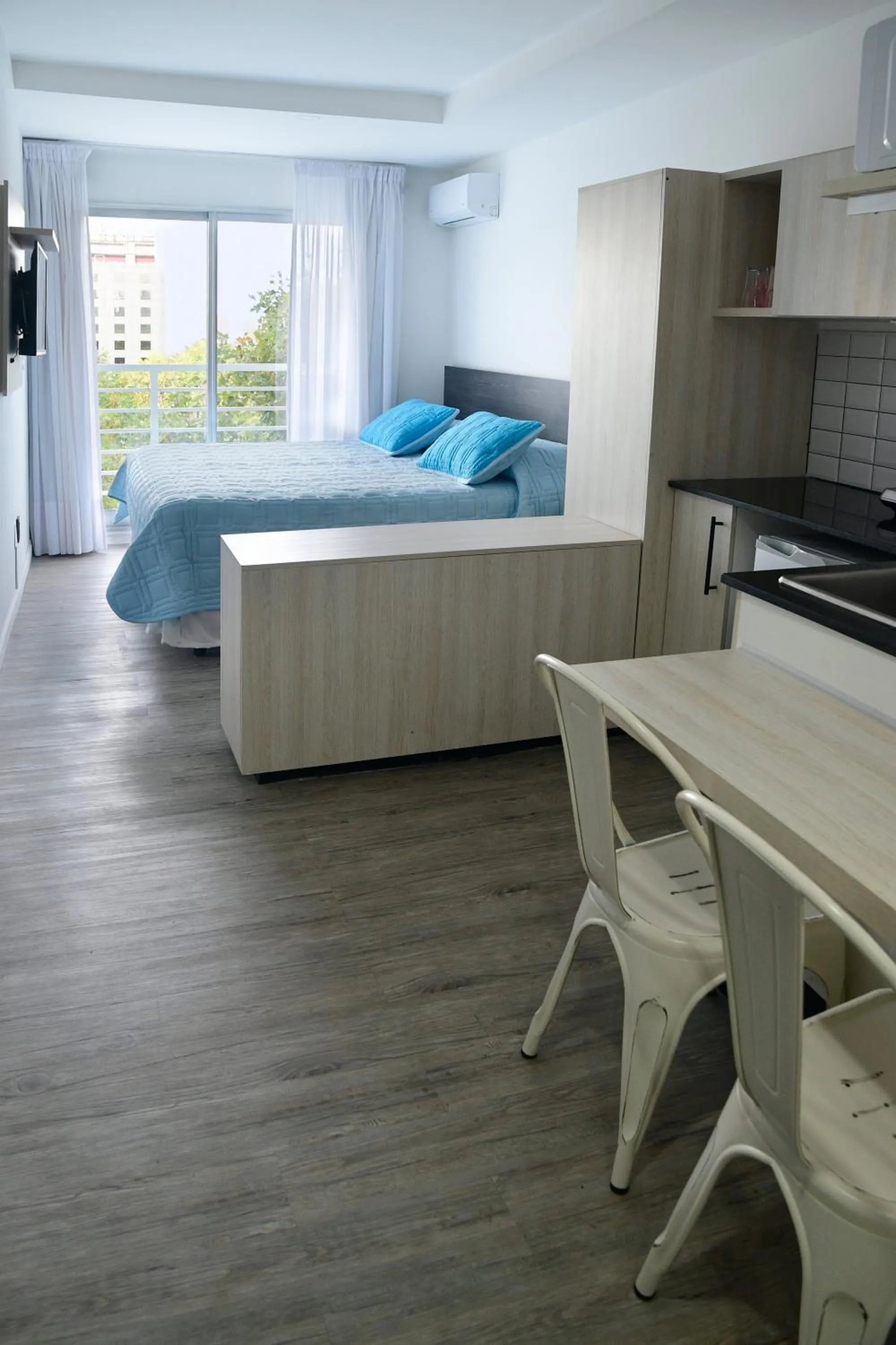 kitchen, Bed in Quijano Hotel - Aparts & Suites