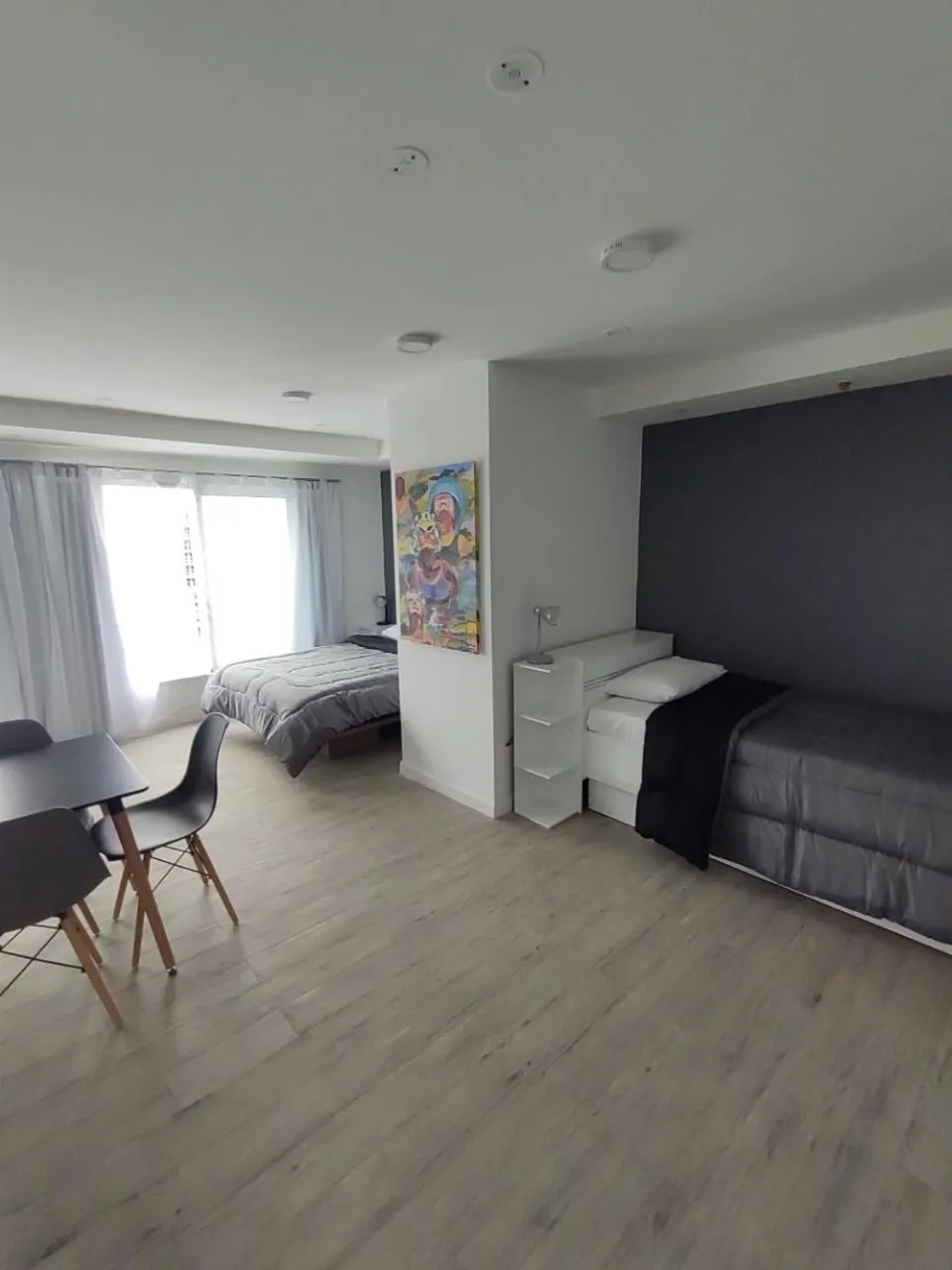 Photo of the whole room, Bed in Quijano Hotel - Aparts & Suites