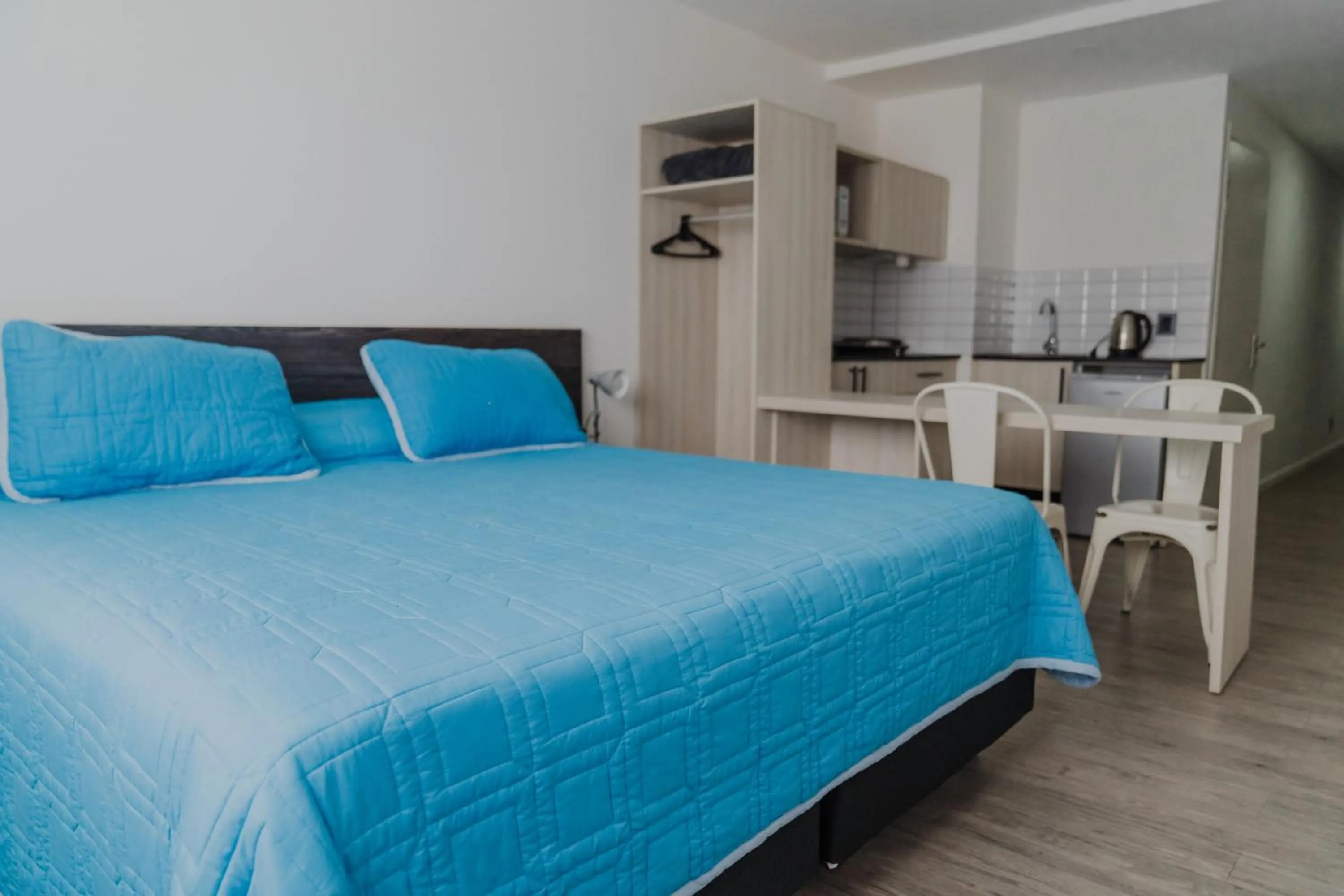 Bed in Quijano Hotel - Aparts & Suites