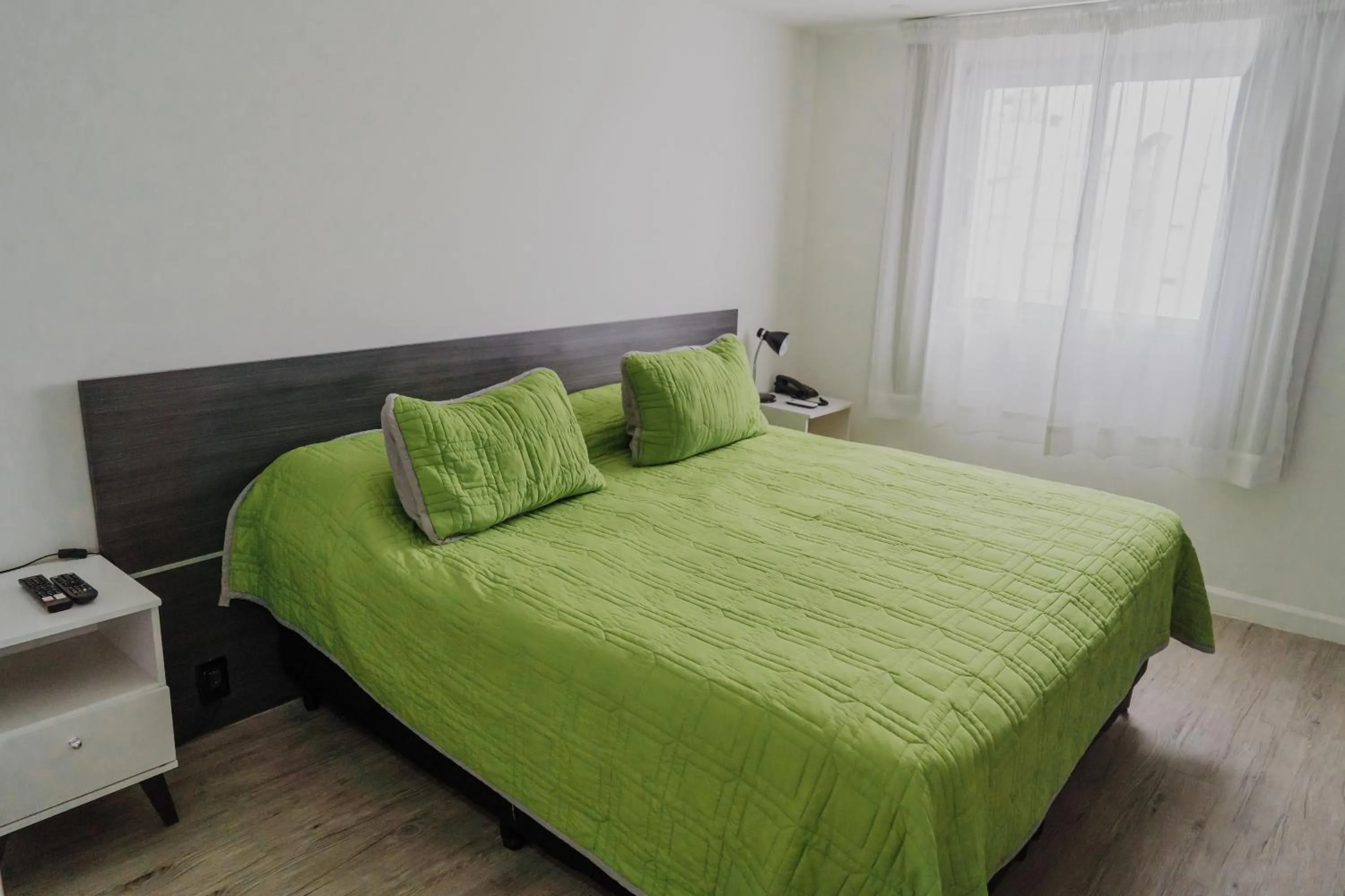 Bed in Quijano Hotel - Aparts & Suites