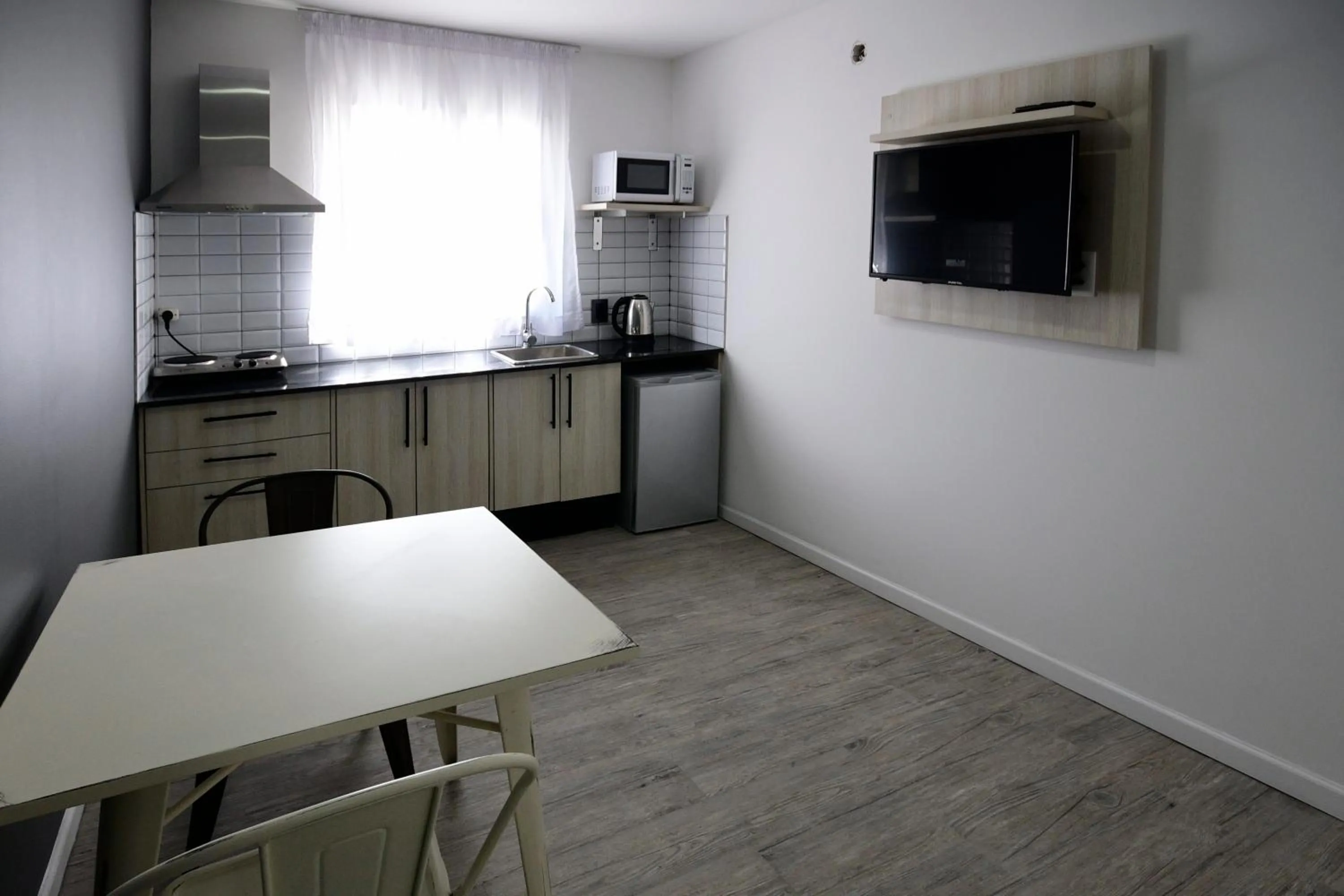Kitchen or kitchenette in Quijano Hotel - Aparts & Suites