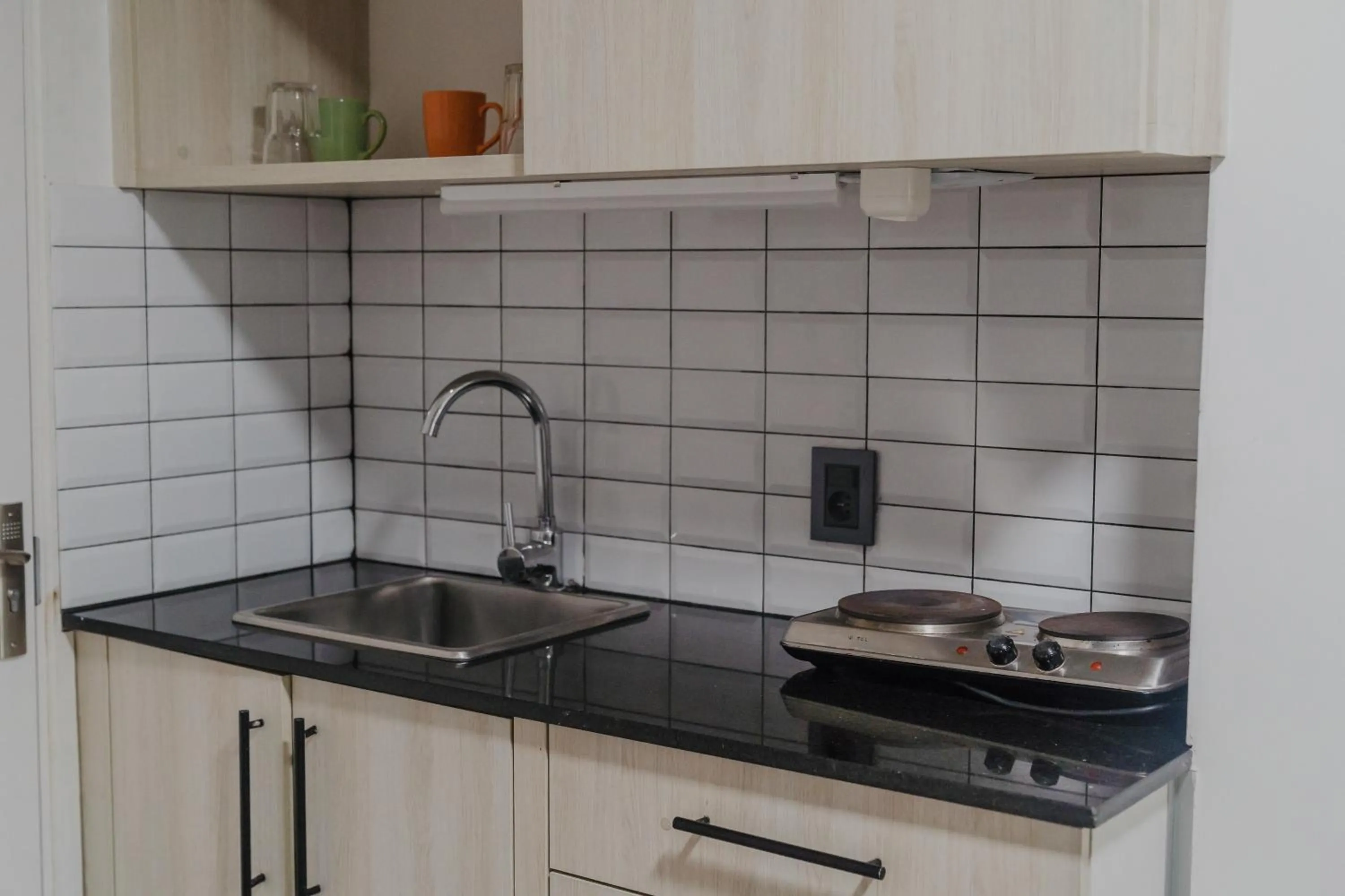 Kitchen or kitchenette in Quijano Hotel - Aparts & Suites