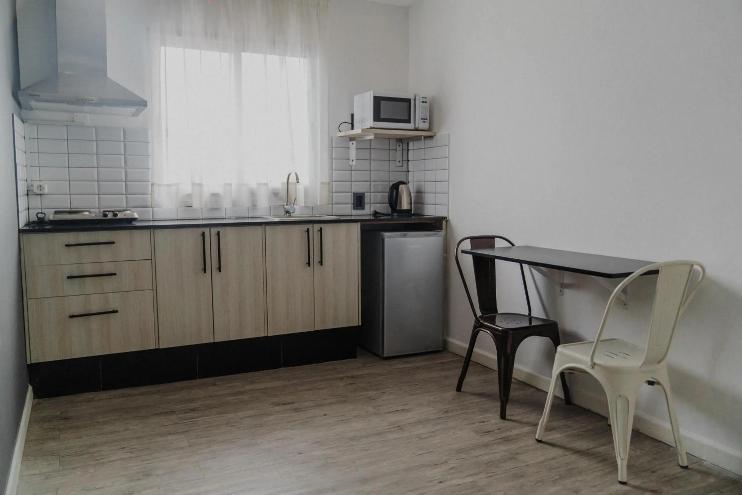 Kitchen or kitchenette in Quijano Hotel - Aparts & Suites