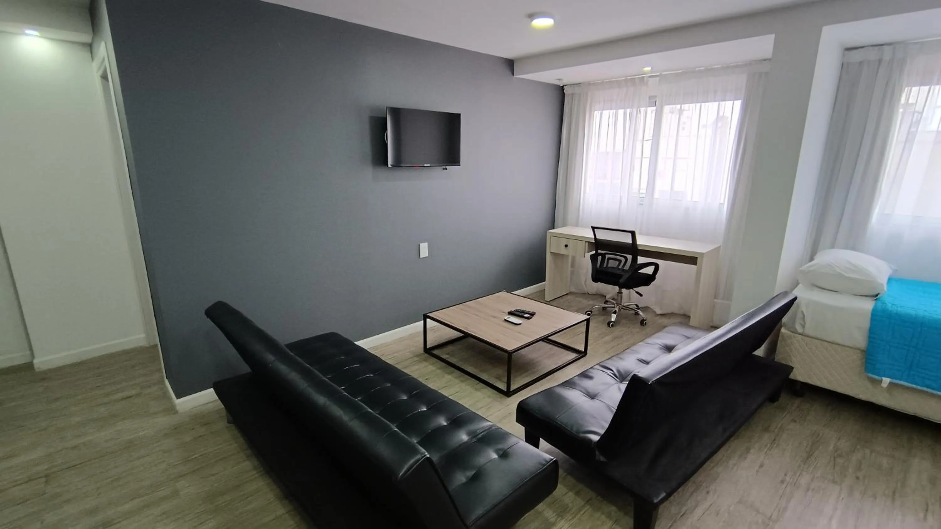 Living room in Quijano Hotel - Aparts & Suites