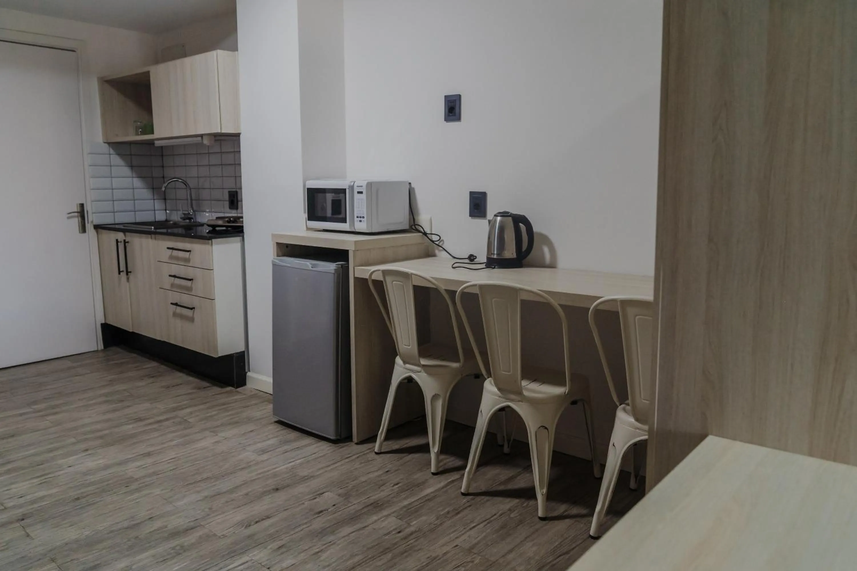 Kitchen or kitchenette in Quijano Hotel - Aparts & Suites