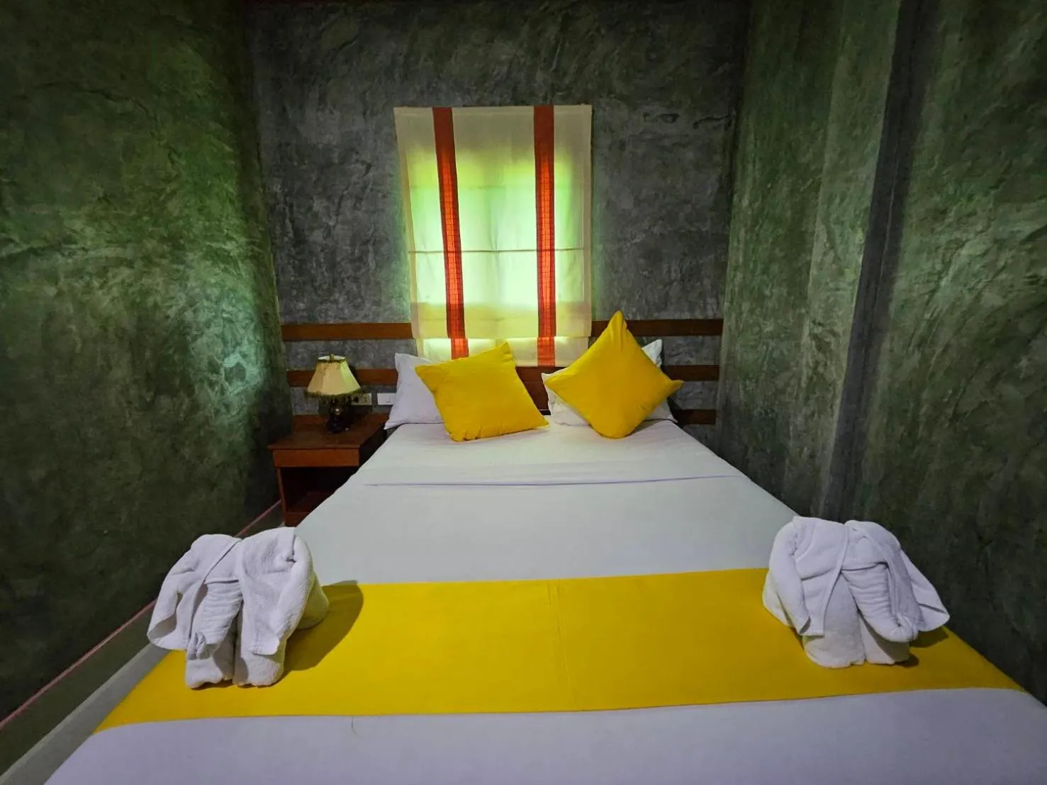 Bed in Araya Boutique Hotel