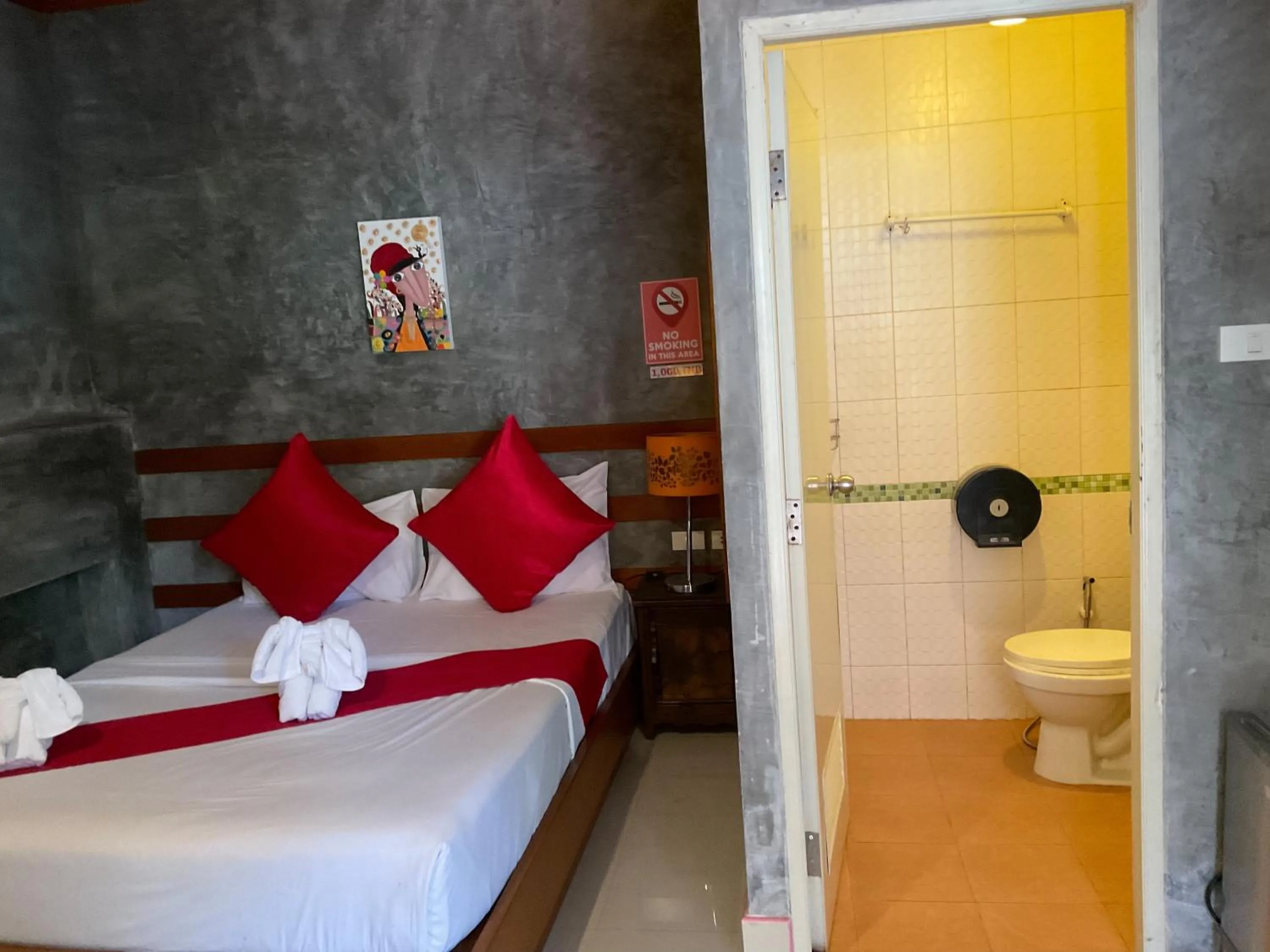 Bed in Araya Boutique Hotel