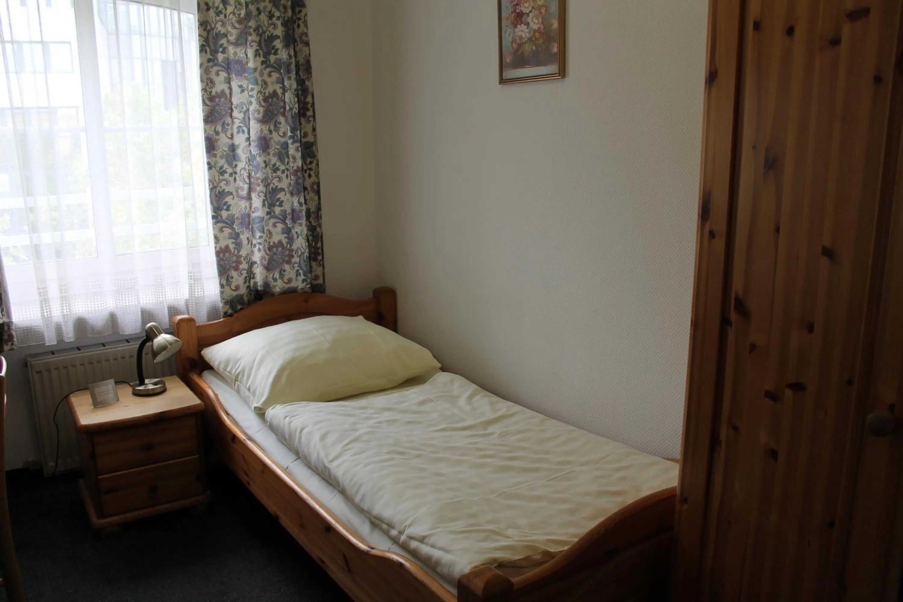 Bed in Pension Locarno