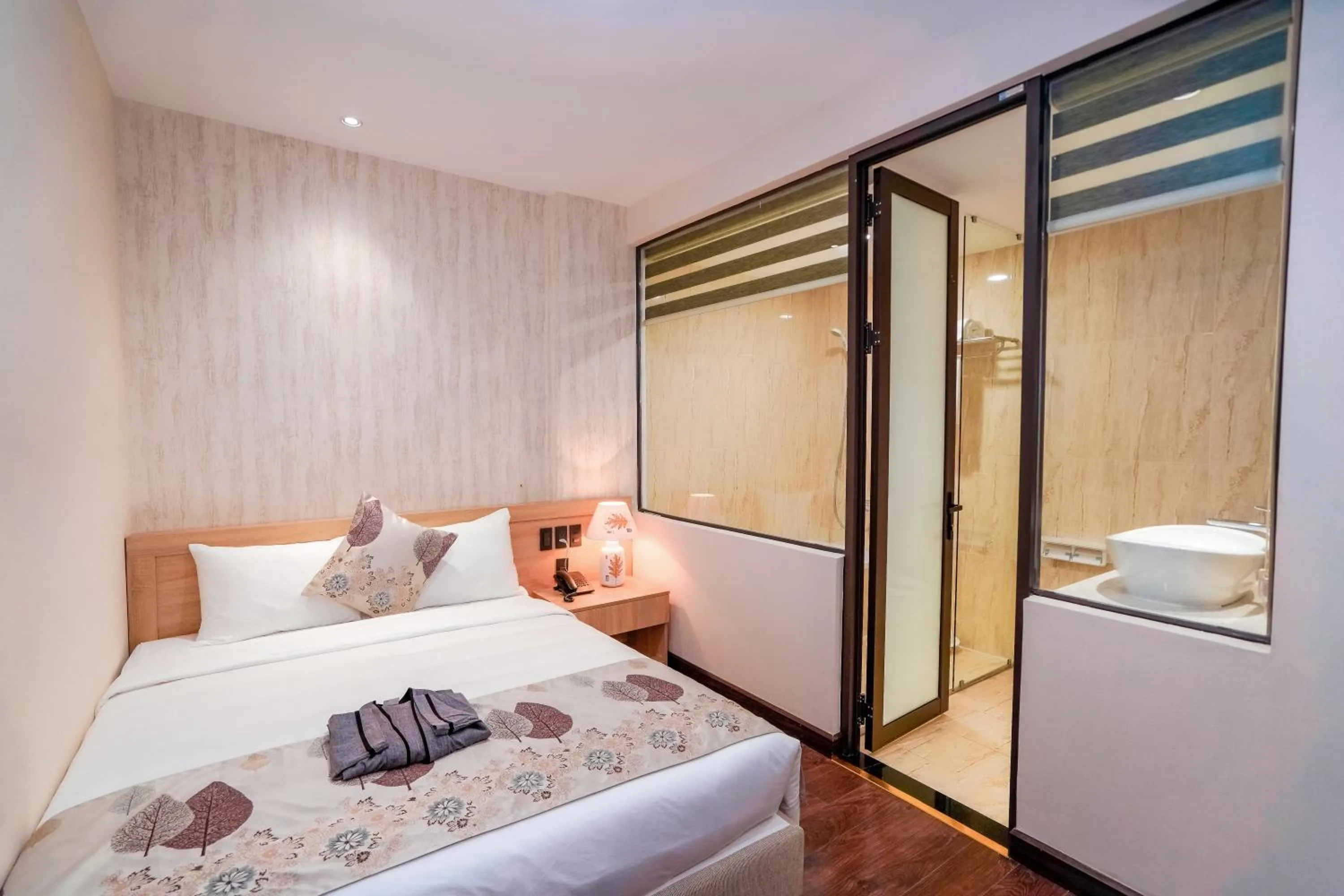 Bed in MOMIZI Hotel HAI PHONG