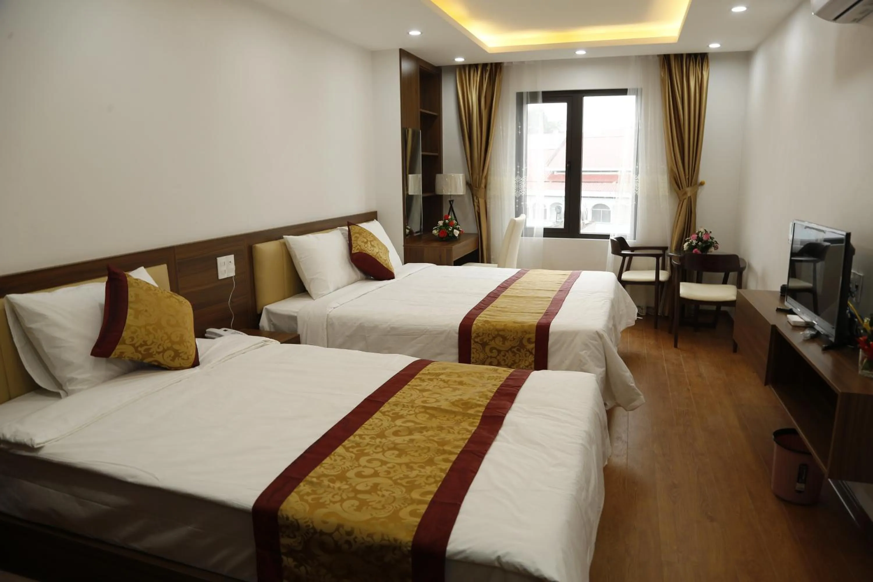 Bed in Bảo Ngọc Diamond Hotel