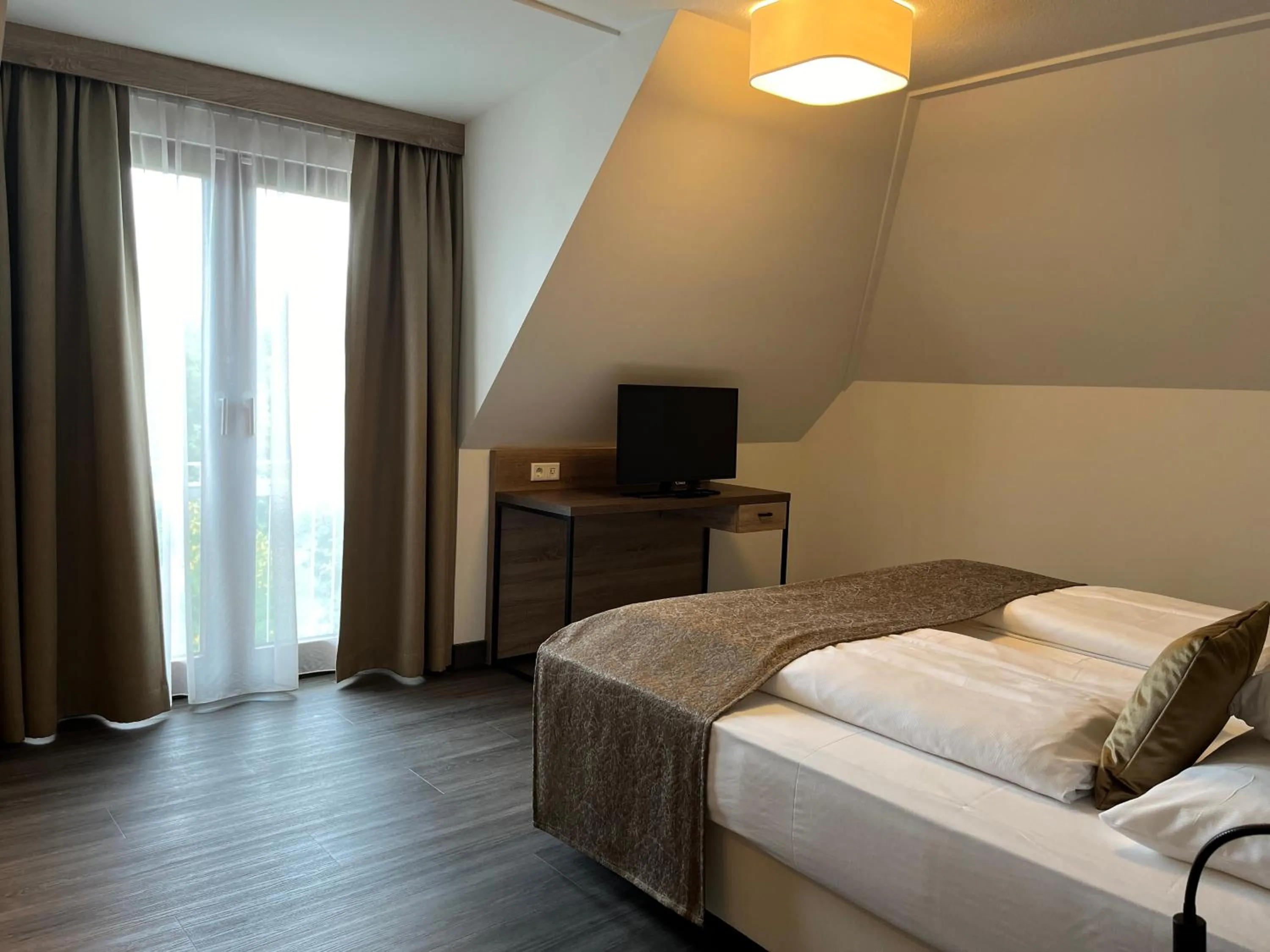 Photo of the whole room, Bed in Flair Park Hotel Ilshofen