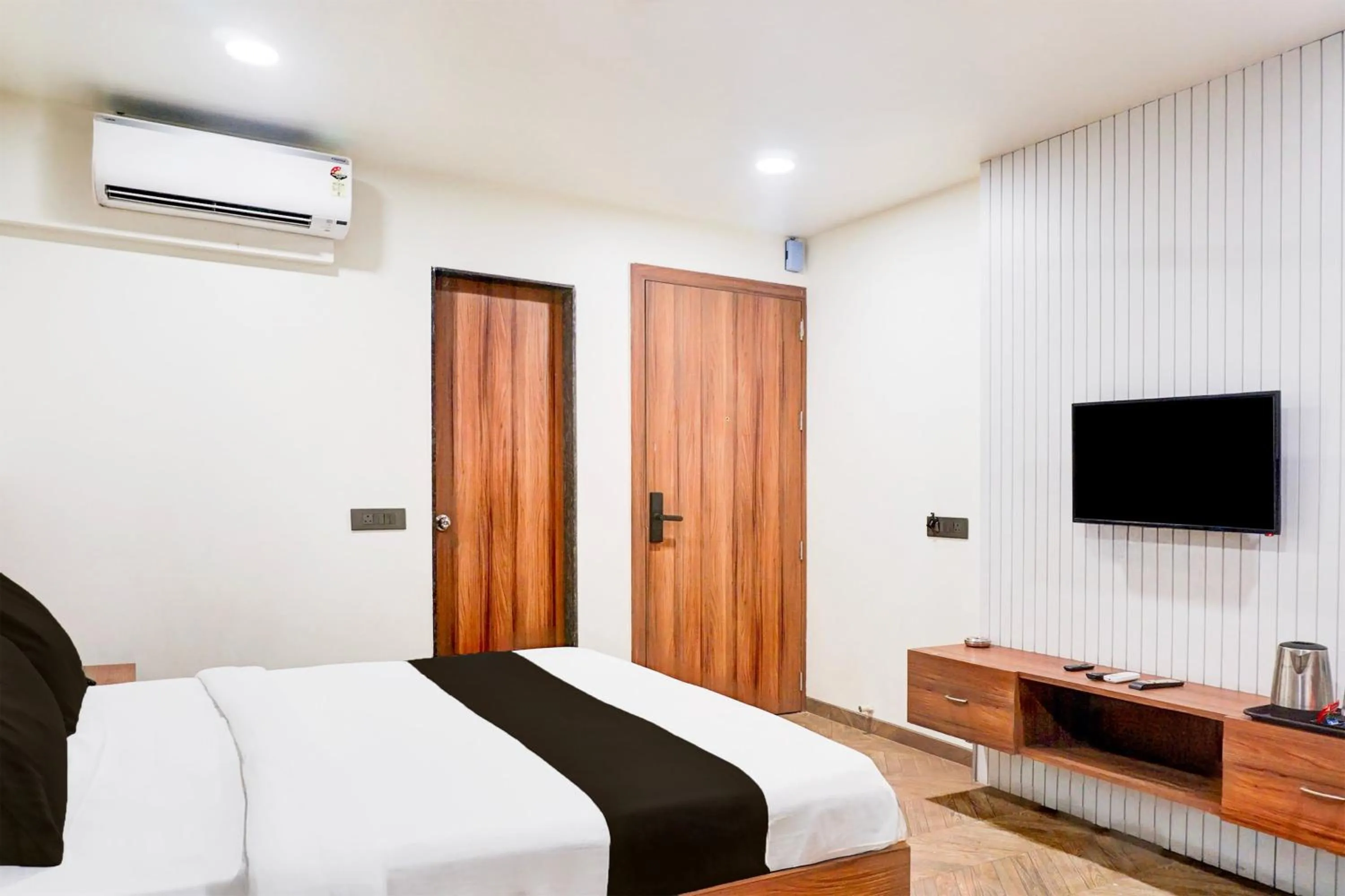 Bedroom, Bed in Super Townhouse Oak Viman Nagar Formerly Kuber Inn