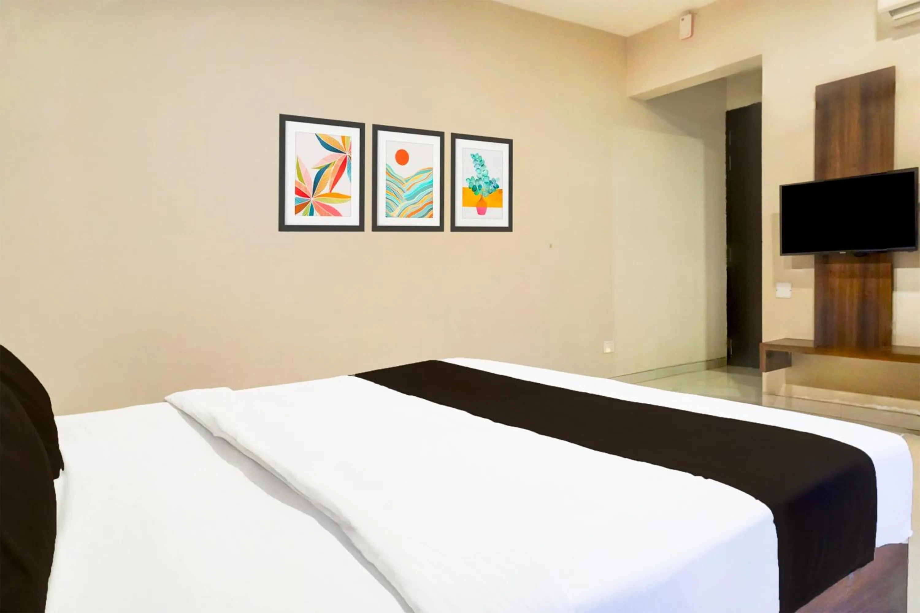 Bedroom, Bed in Super Townhouse Oak Viman Nagar Formerly Kuber Inn