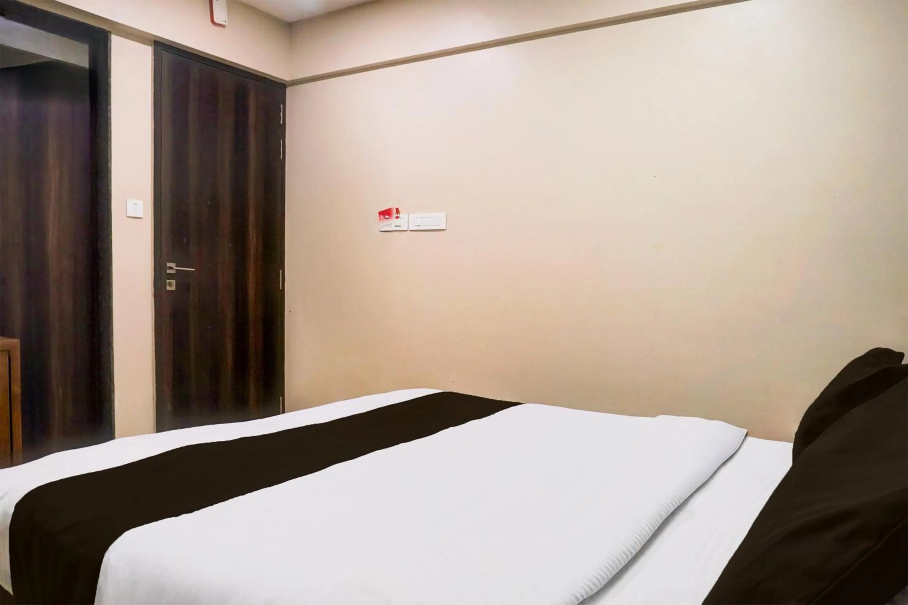 Bedroom, Bed in Super Townhouse Oak Viman Nagar Formerly Kuber Inn