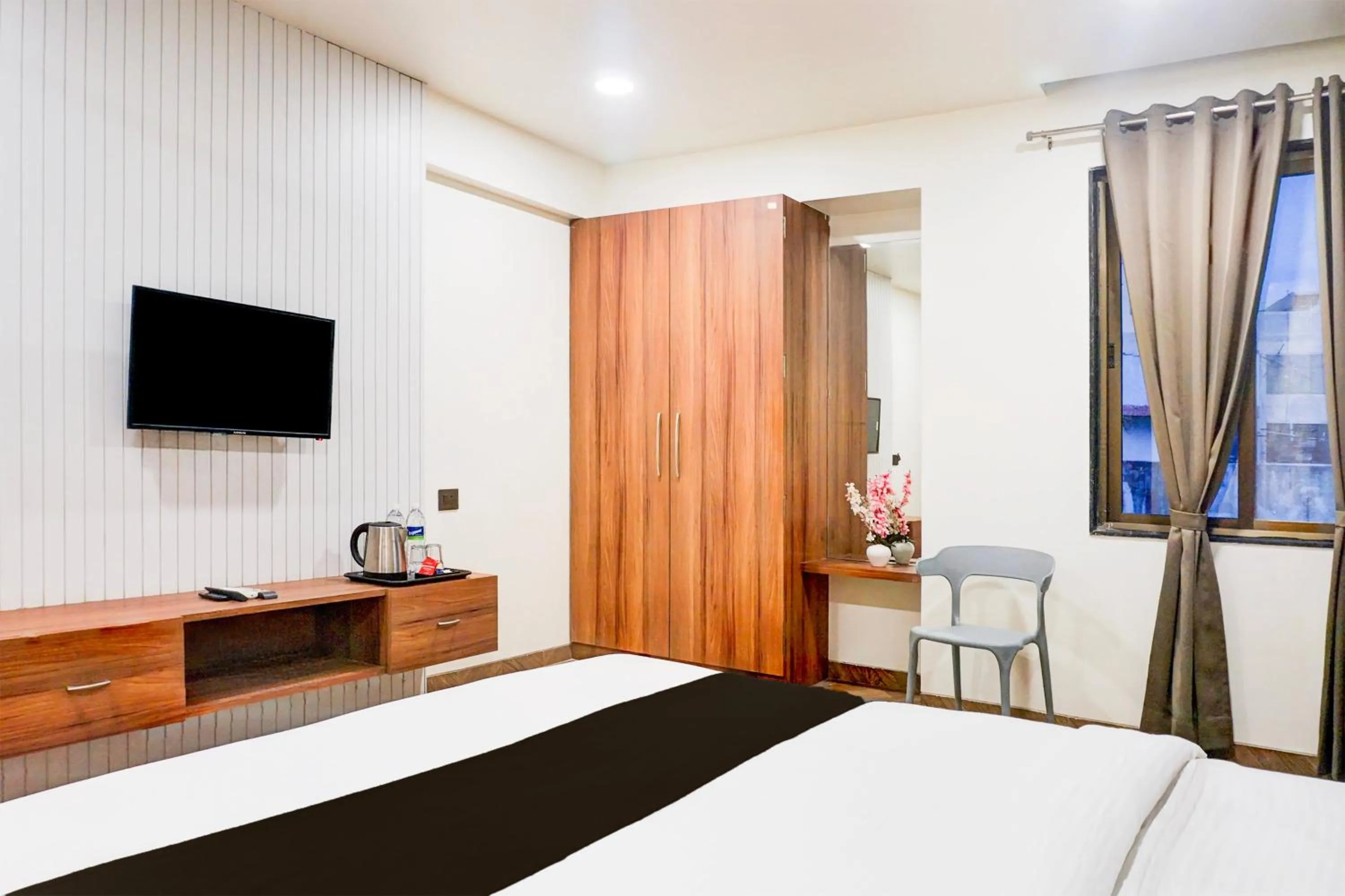 Bedroom, Bed in Super Townhouse Oak Viman Nagar Formerly Kuber Inn