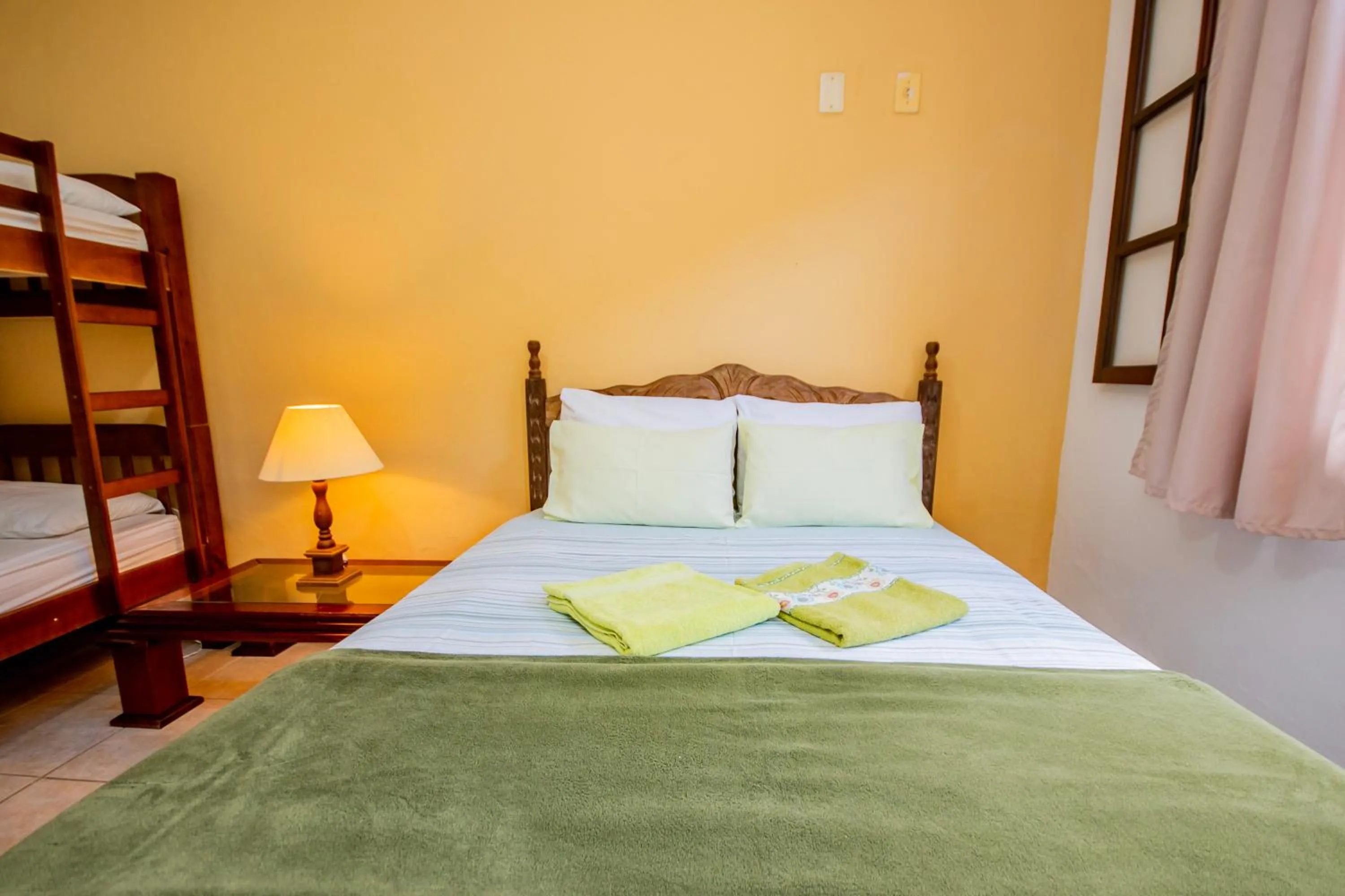 Bed in Pousada Quatro Estações Paraty