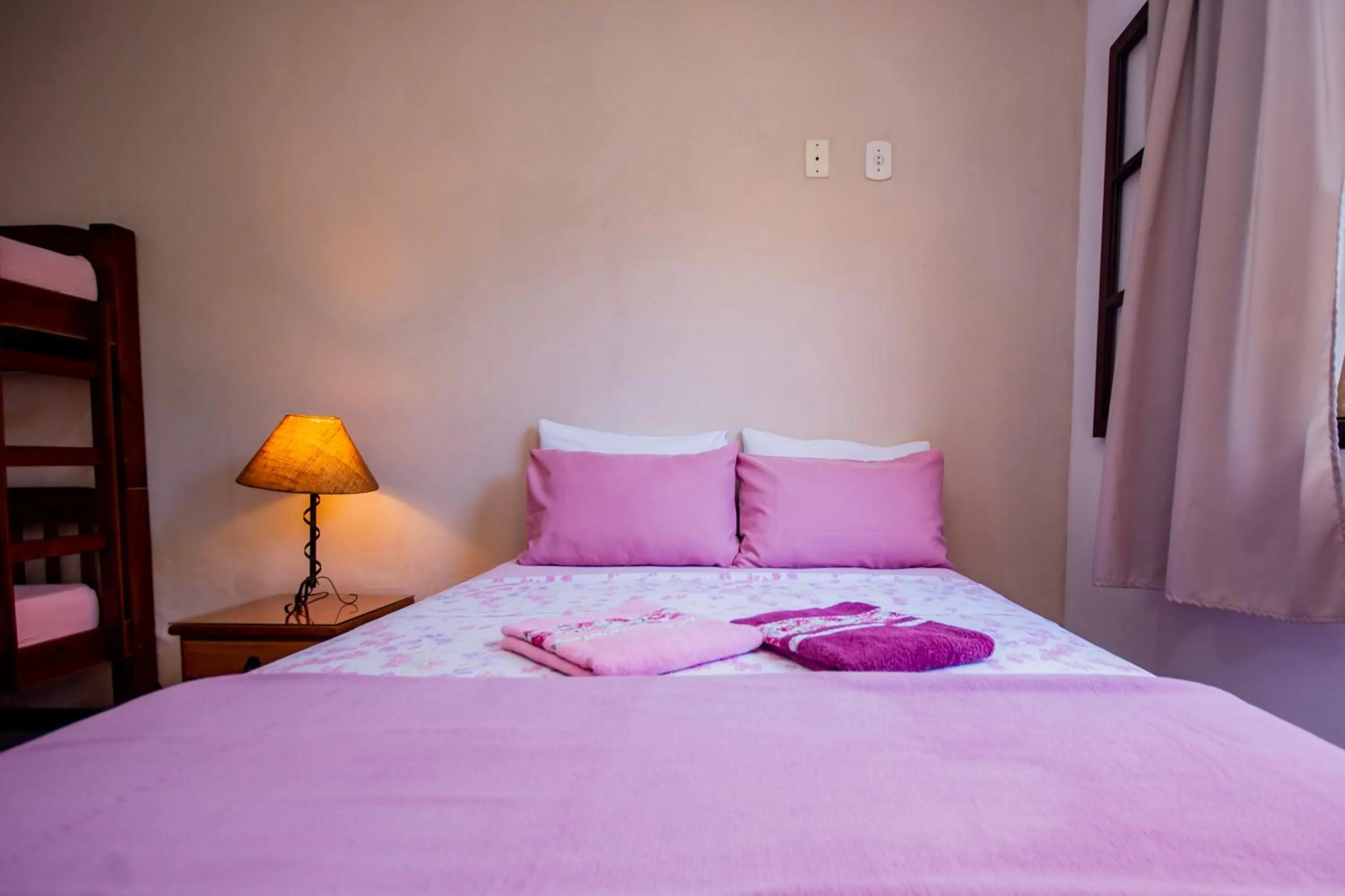 Bed in Pousada Quatro Estações Paraty