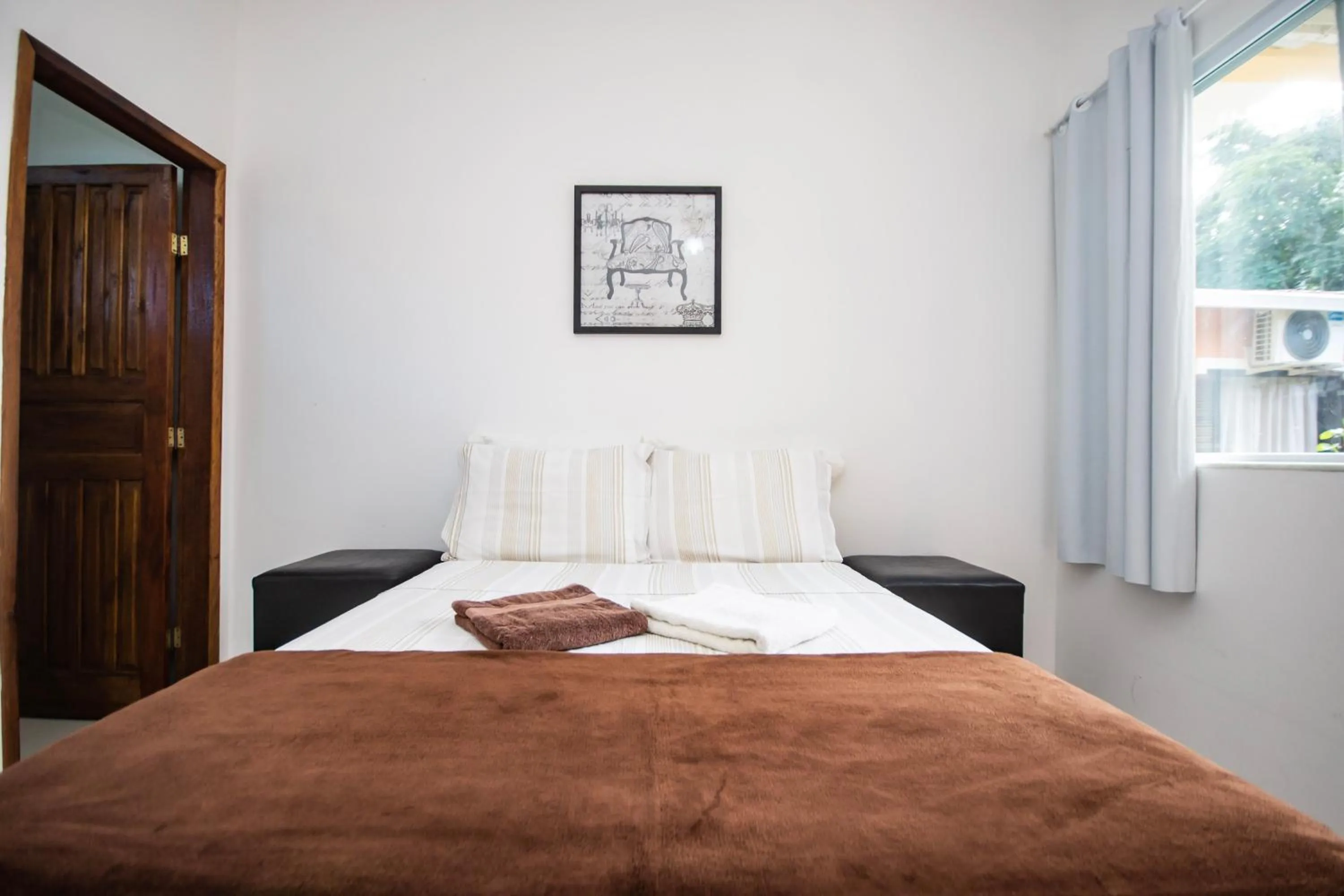 Bed in Pousada Quatro Estações Paraty