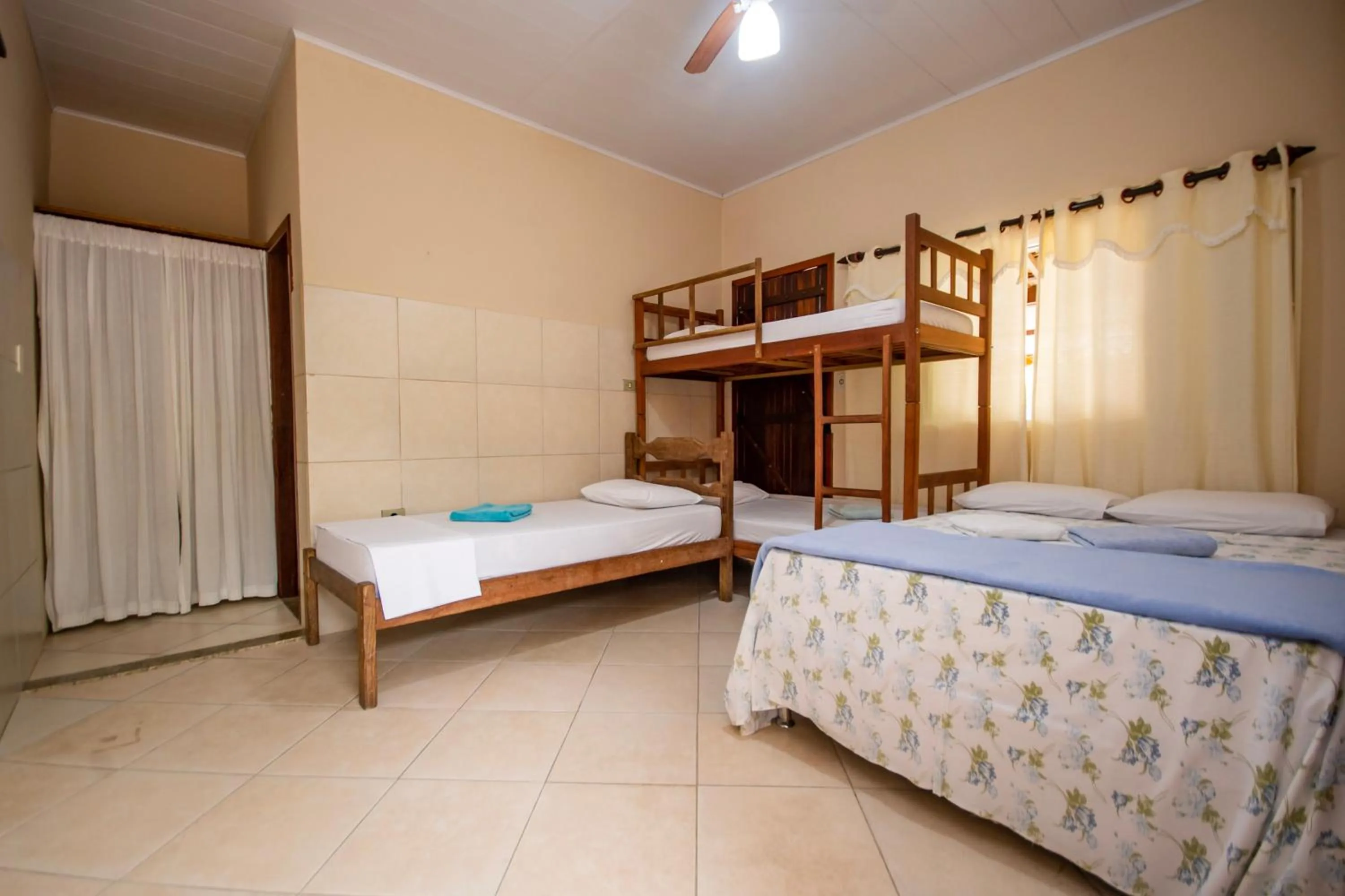 Photo of the whole room, Bed in Pousada Quatro Estações Paraty