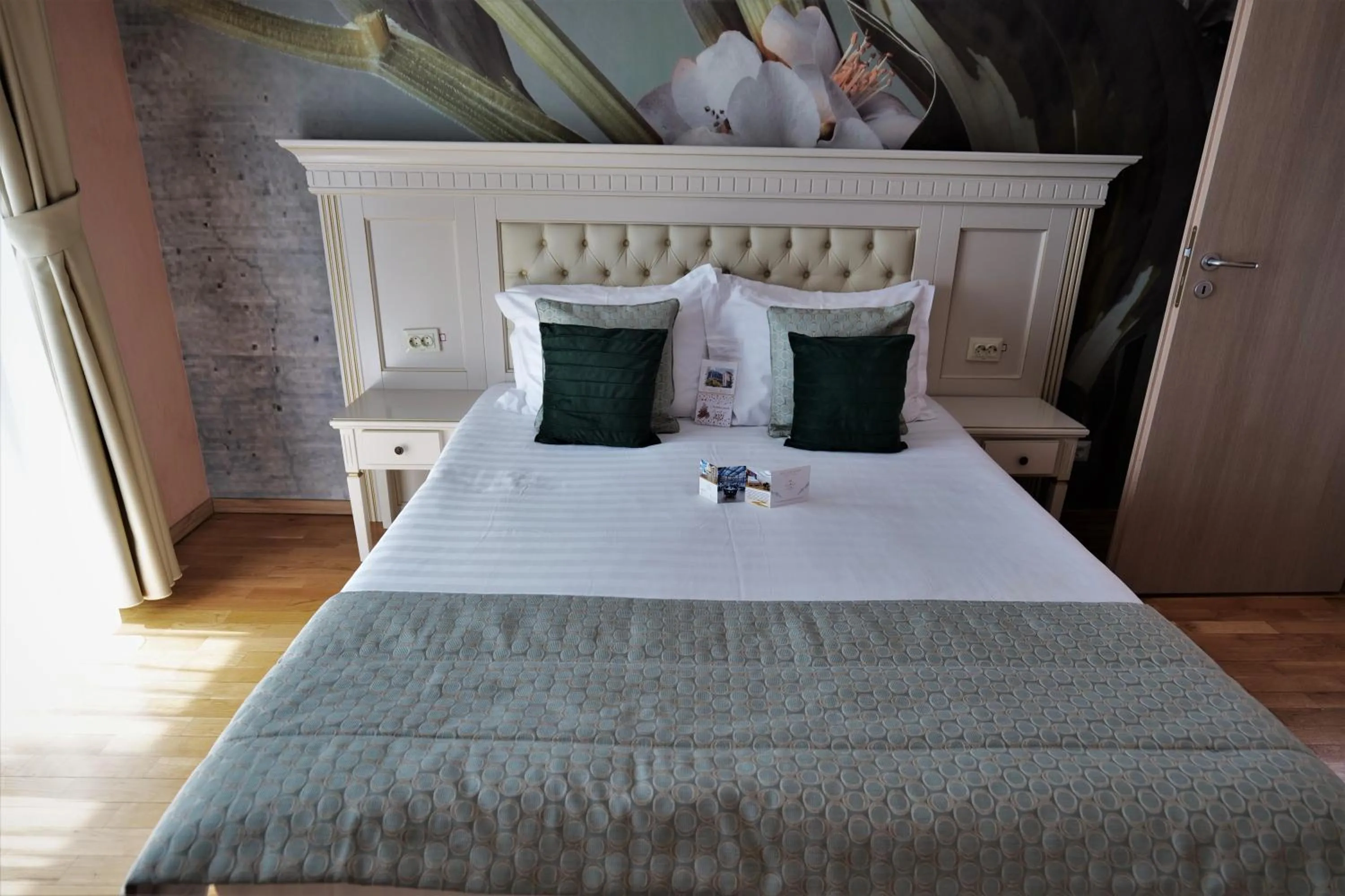 Bed in Park Luxury Rooms