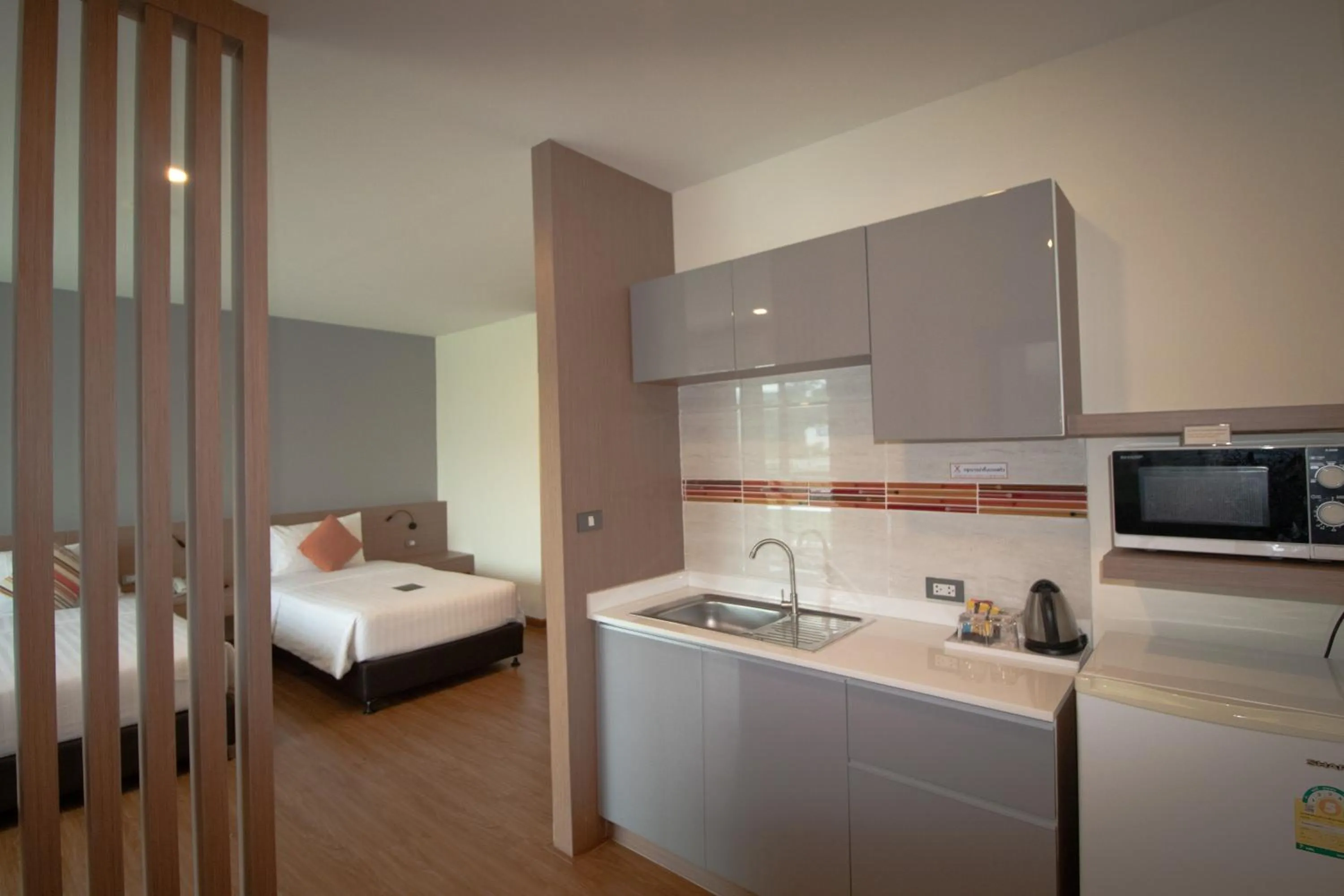 Bed in Phavina Hotel & Grand Boutique Rayong