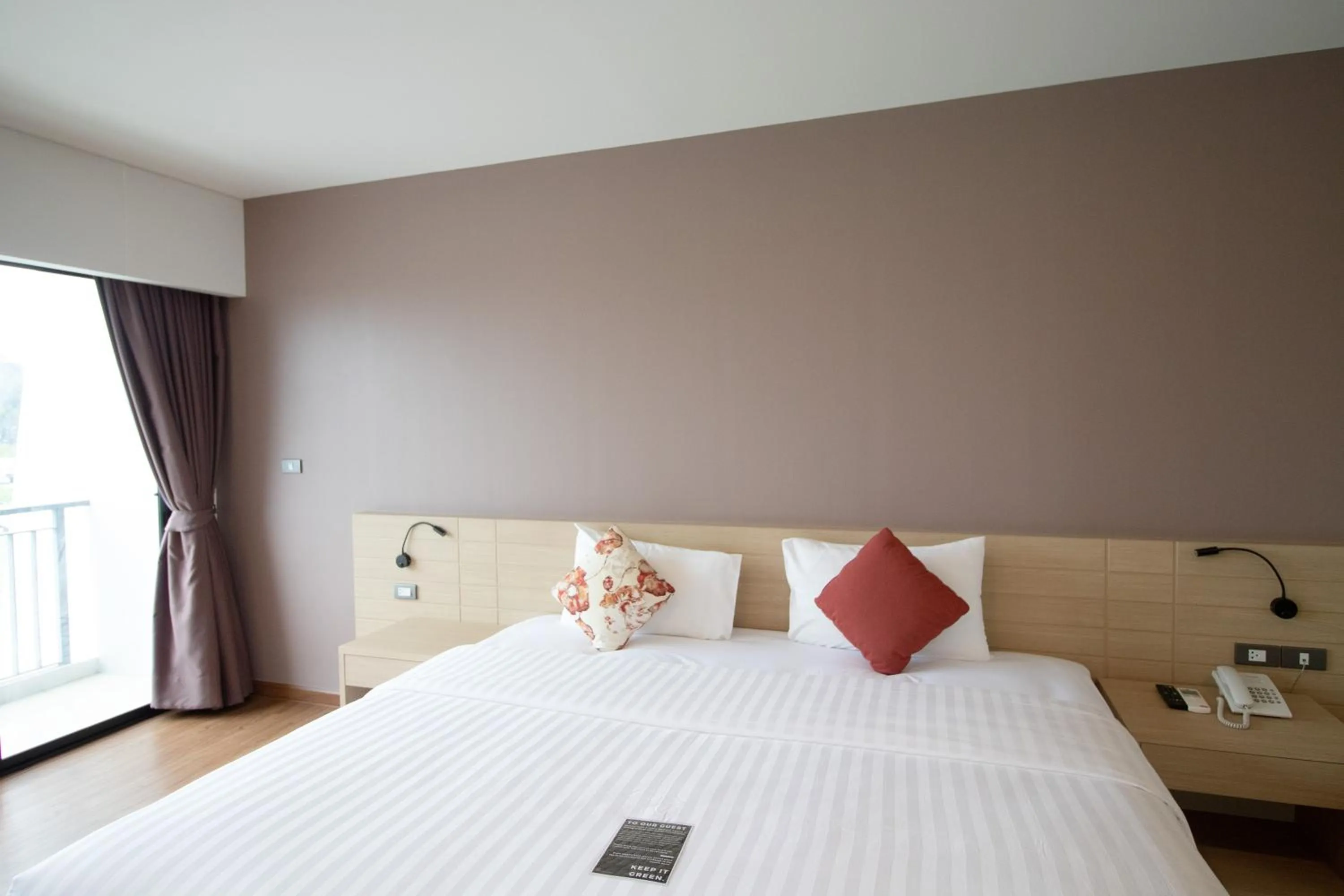 Bed in Phavina Hotel & Grand Boutique Rayong