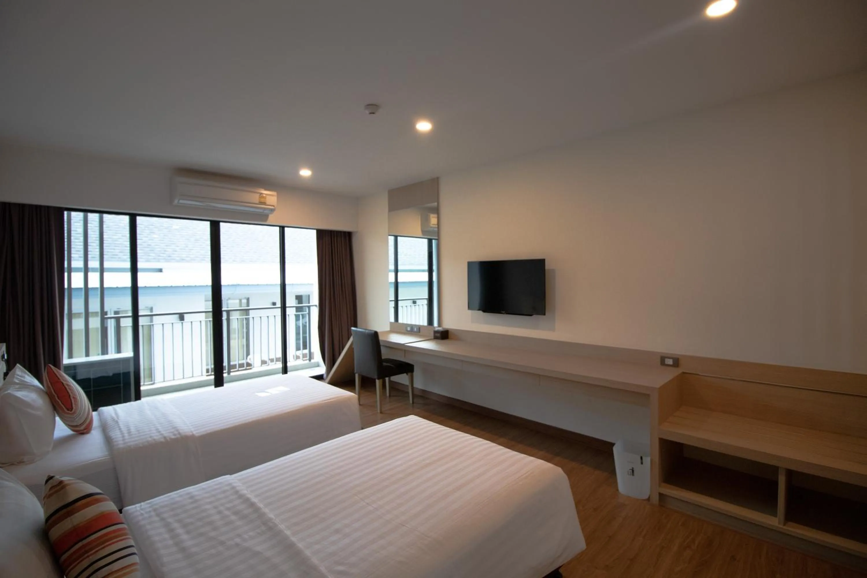 Bed in Phavina Hotel & Grand Boutique Rayong