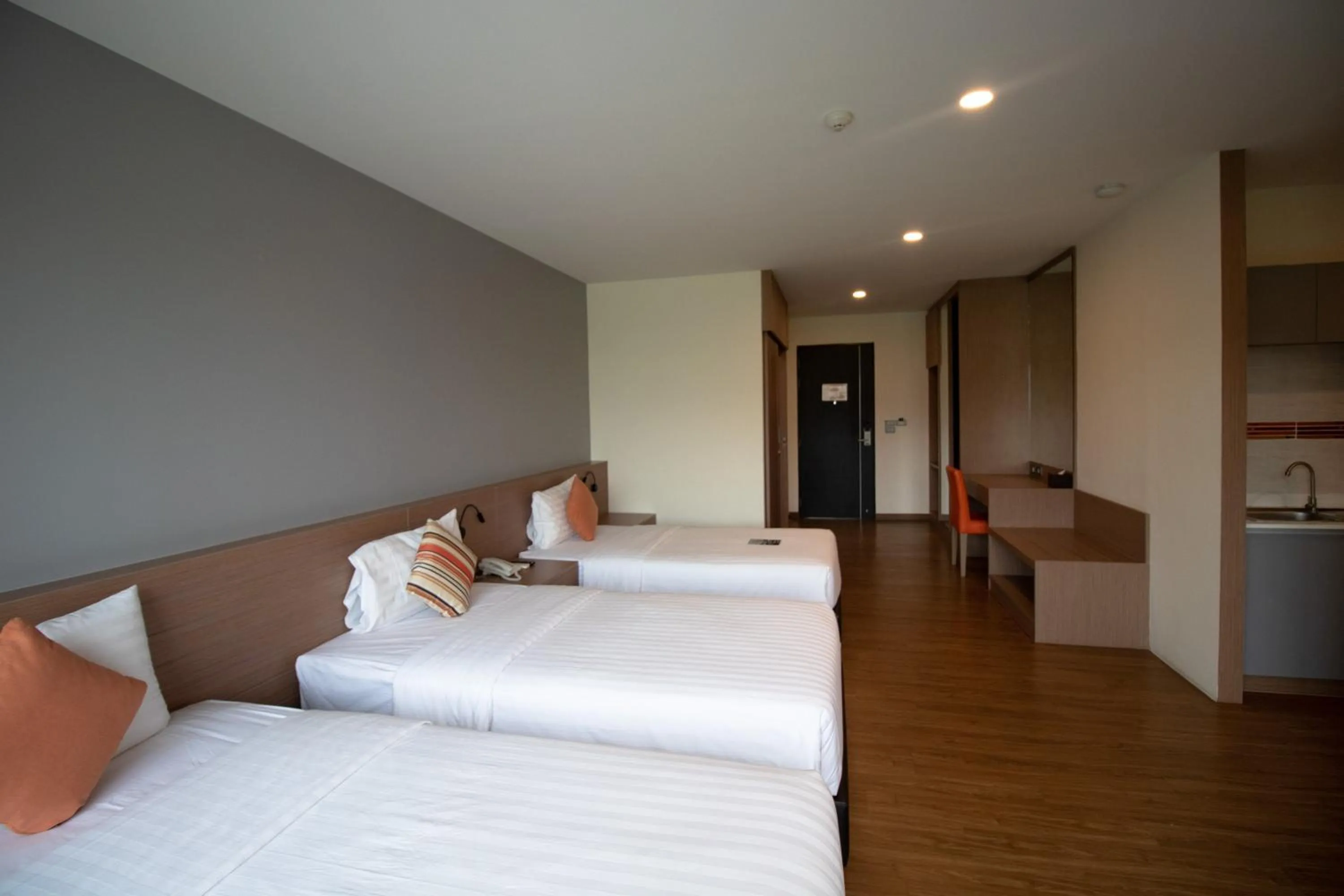 Bed in Phavina Hotel & Grand Boutique Rayong