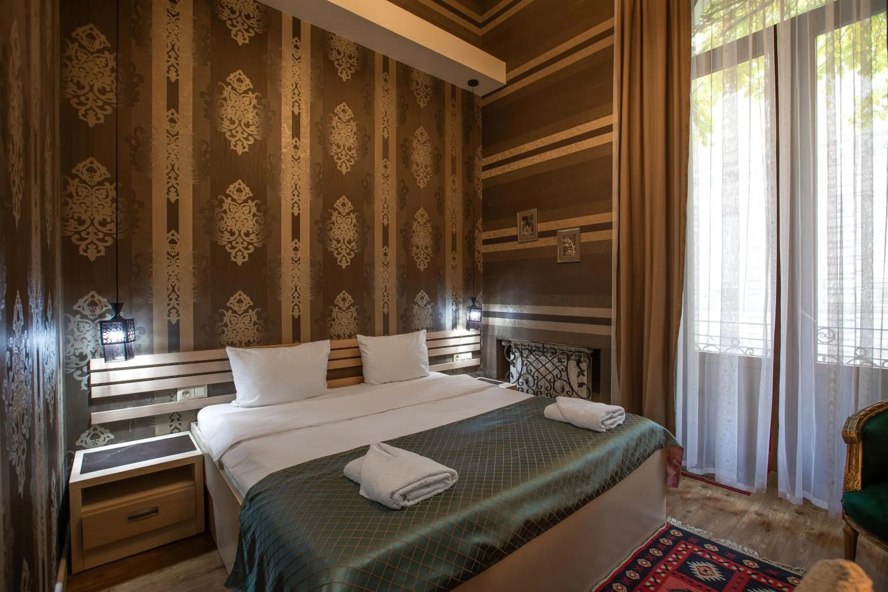 Bed in Rustaveli Hotel