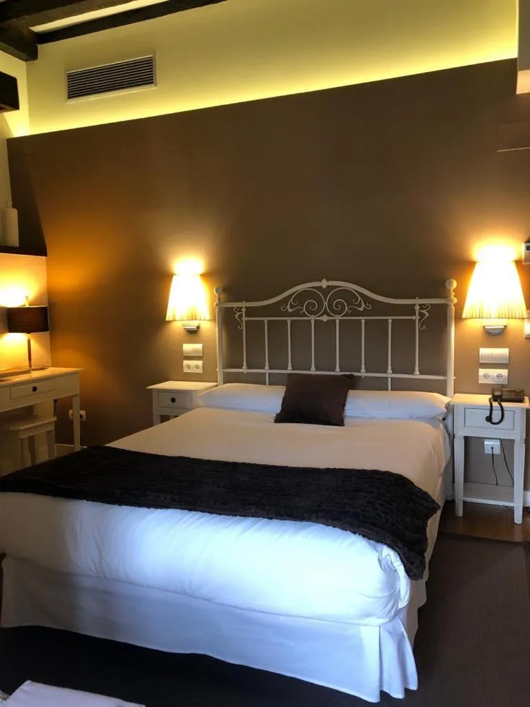 Photo of the whole room, Bed in Hotel Torre Zumeltzegi