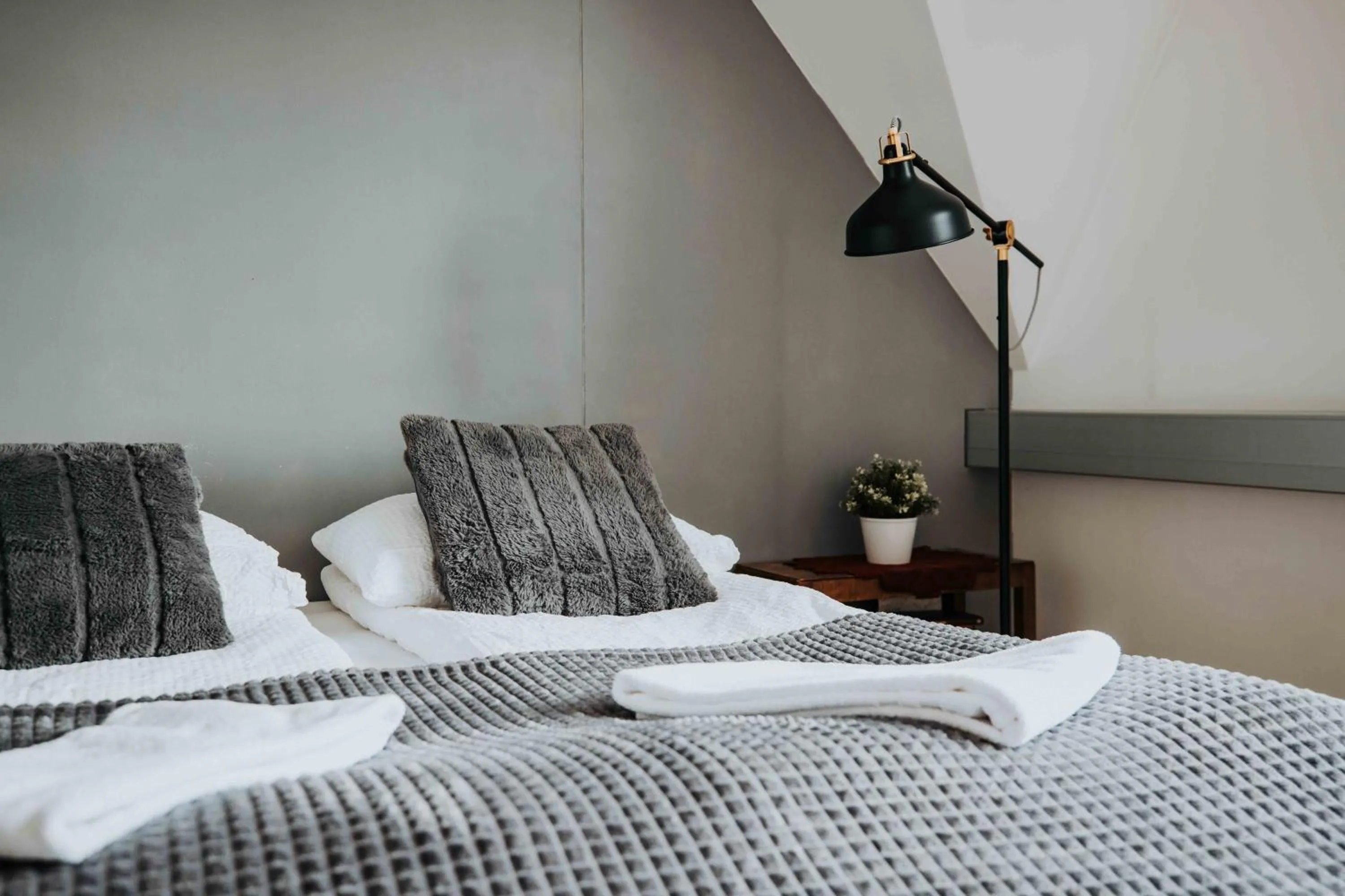 Bed in Héradsskólinn Historic Guesthouse