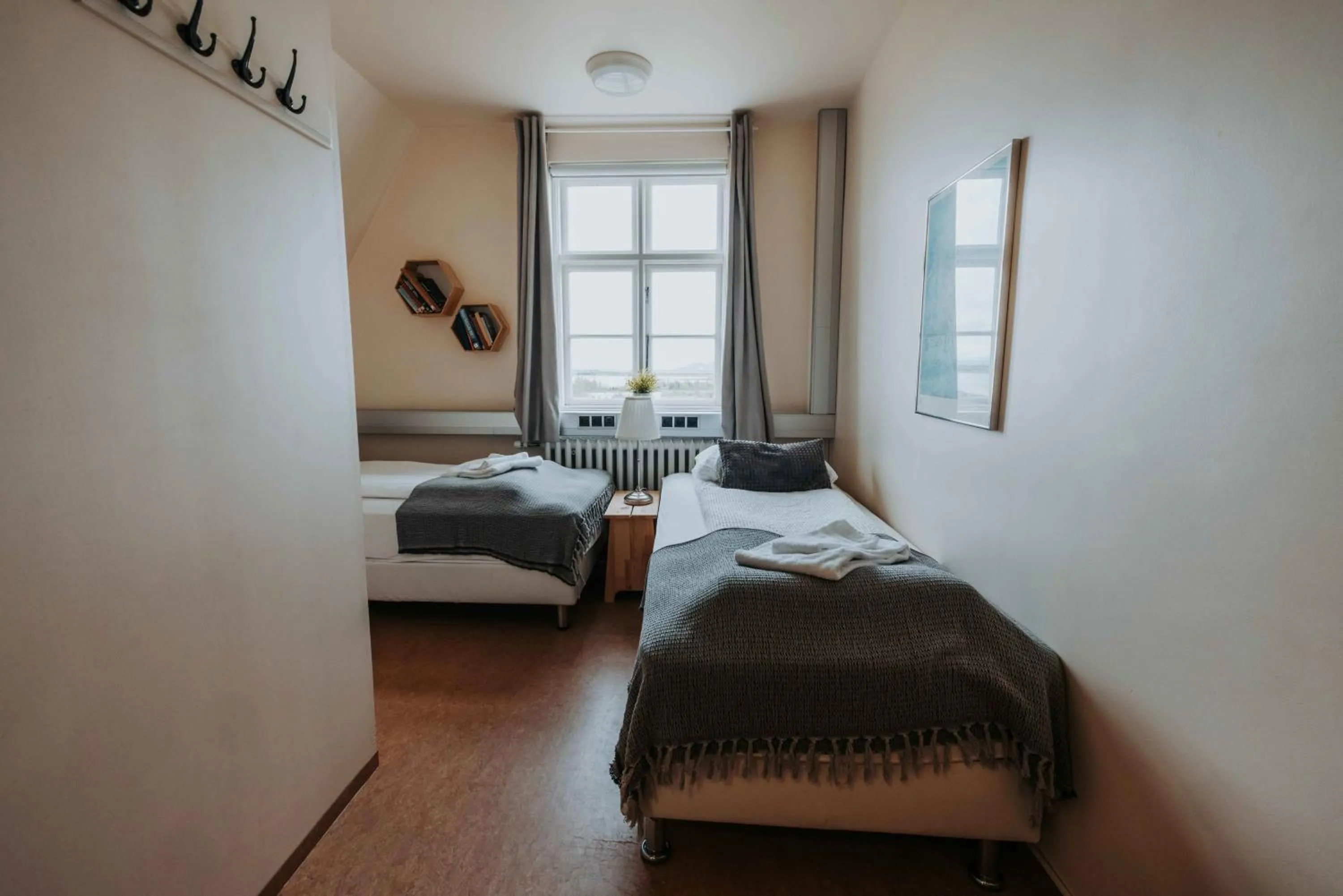 Bed in Héradsskólinn Historic Guesthouse