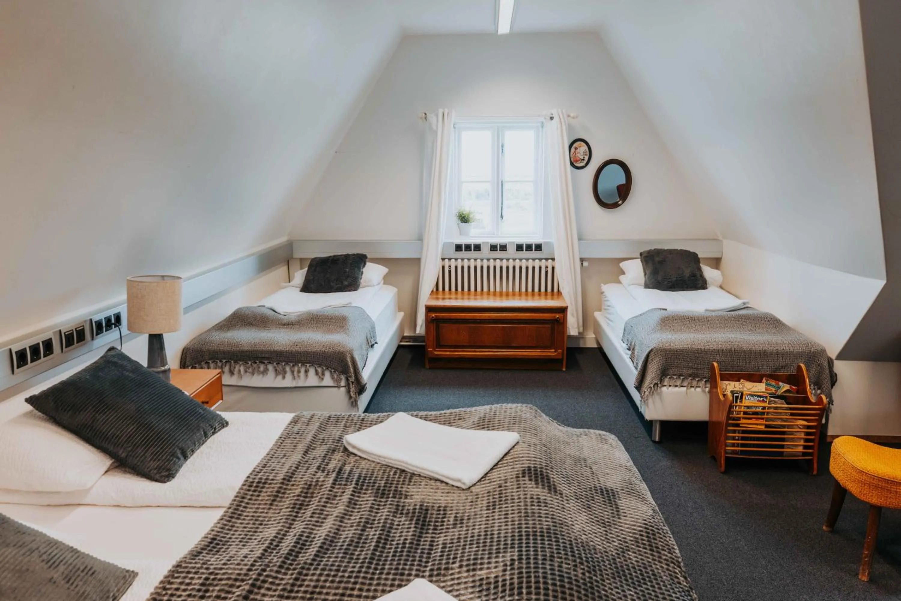 Bed in Héradsskólinn Historic Guesthouse