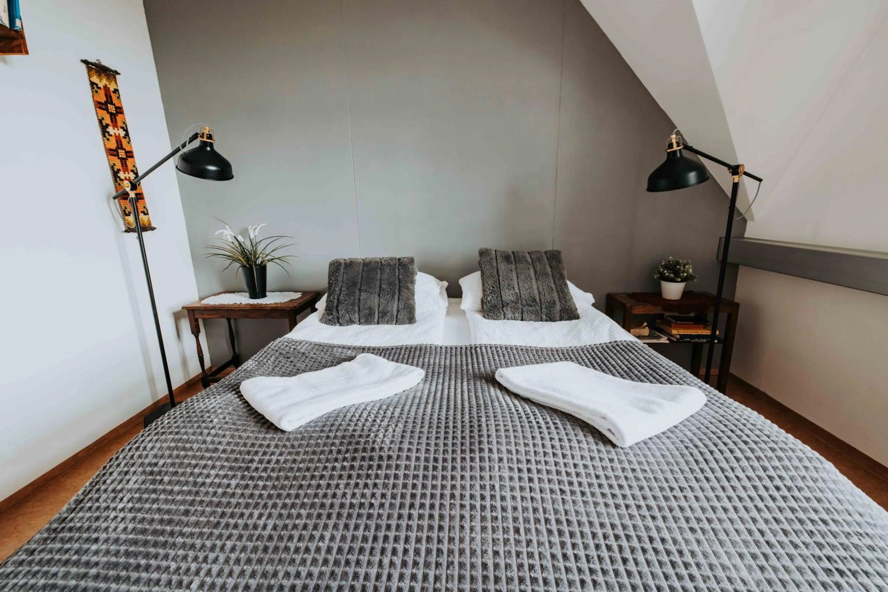 Bed in Héradsskólinn Historic Guesthouse