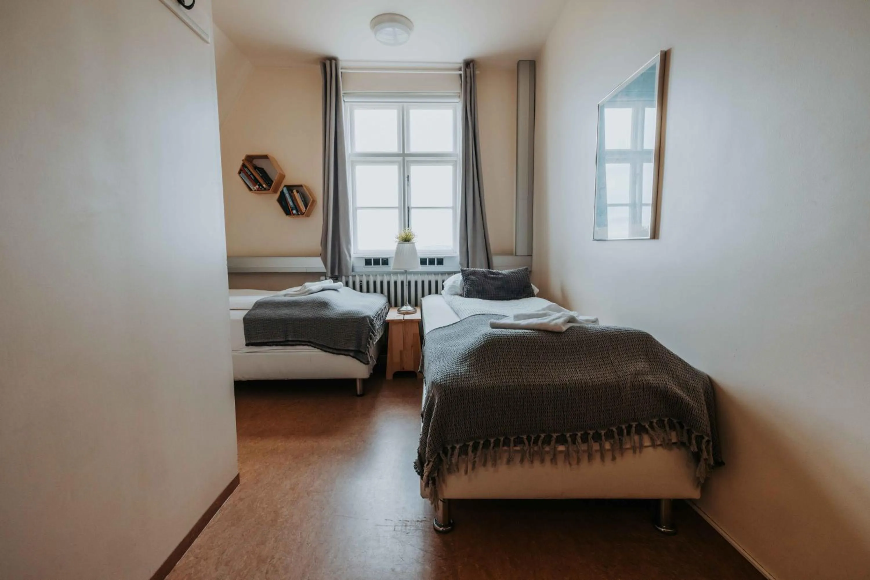 Bed in Héradsskólinn Historic Guesthouse