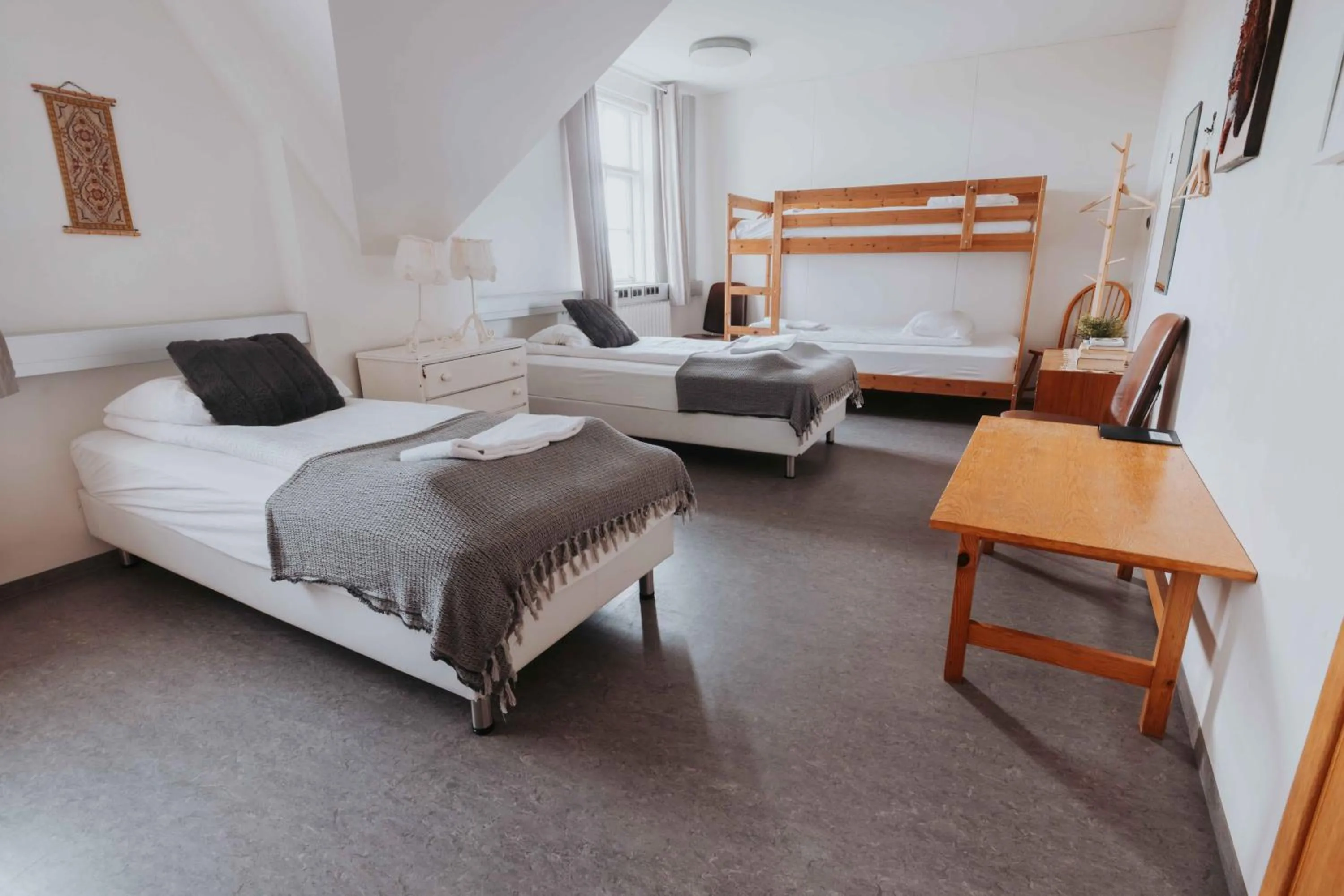 Bed in Héradsskólinn Historic Guesthouse