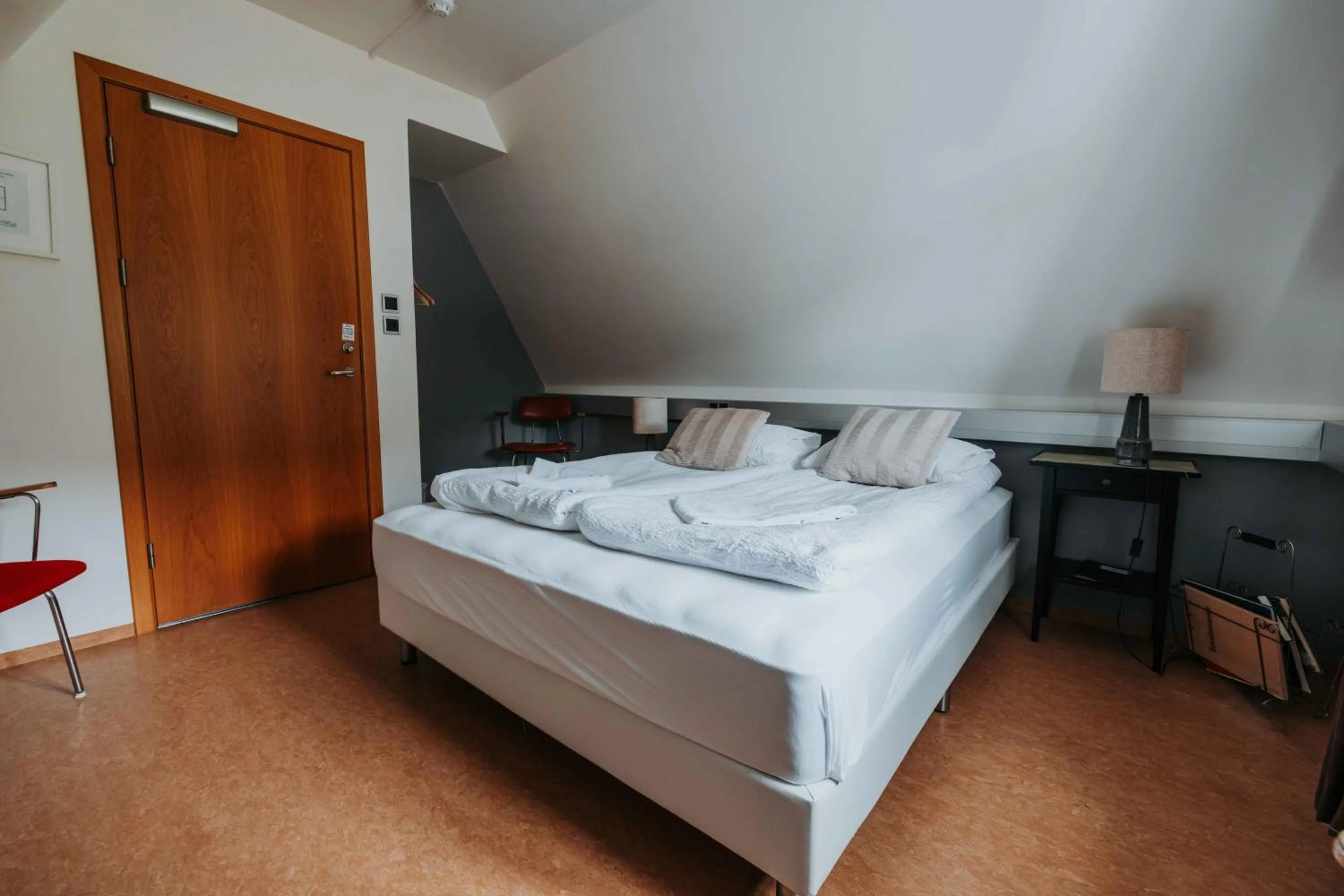 Bed in Héradsskólinn Historic Guesthouse