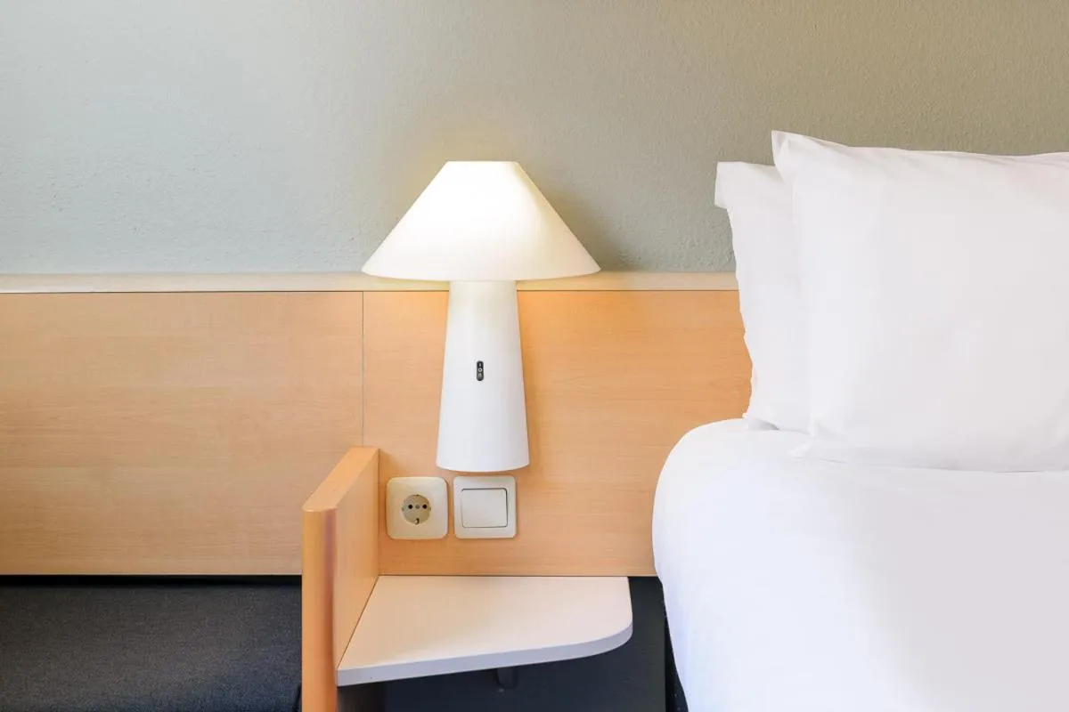 Decorative detail, Bed in ibis Augsburg Koenigsplatz