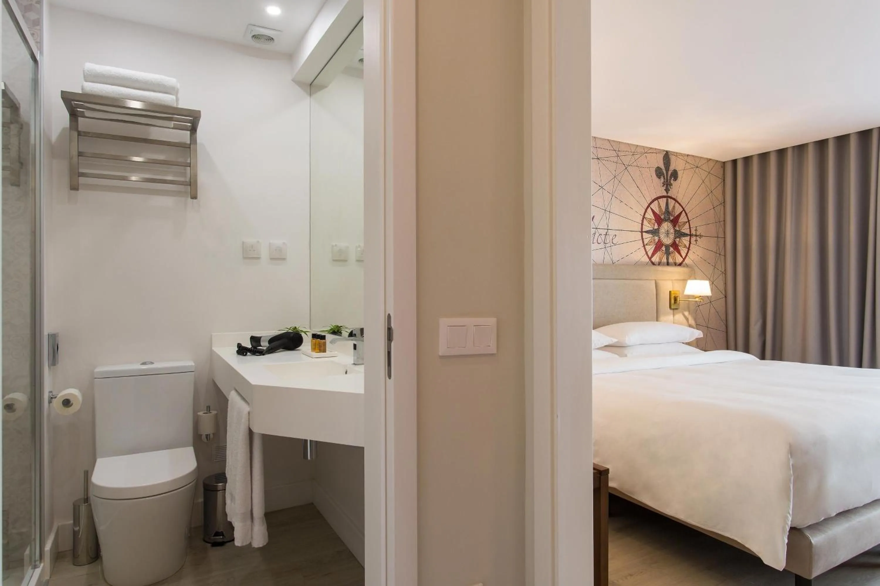 Bathroom, Bed in Four Points by Sheraton Sesimbra