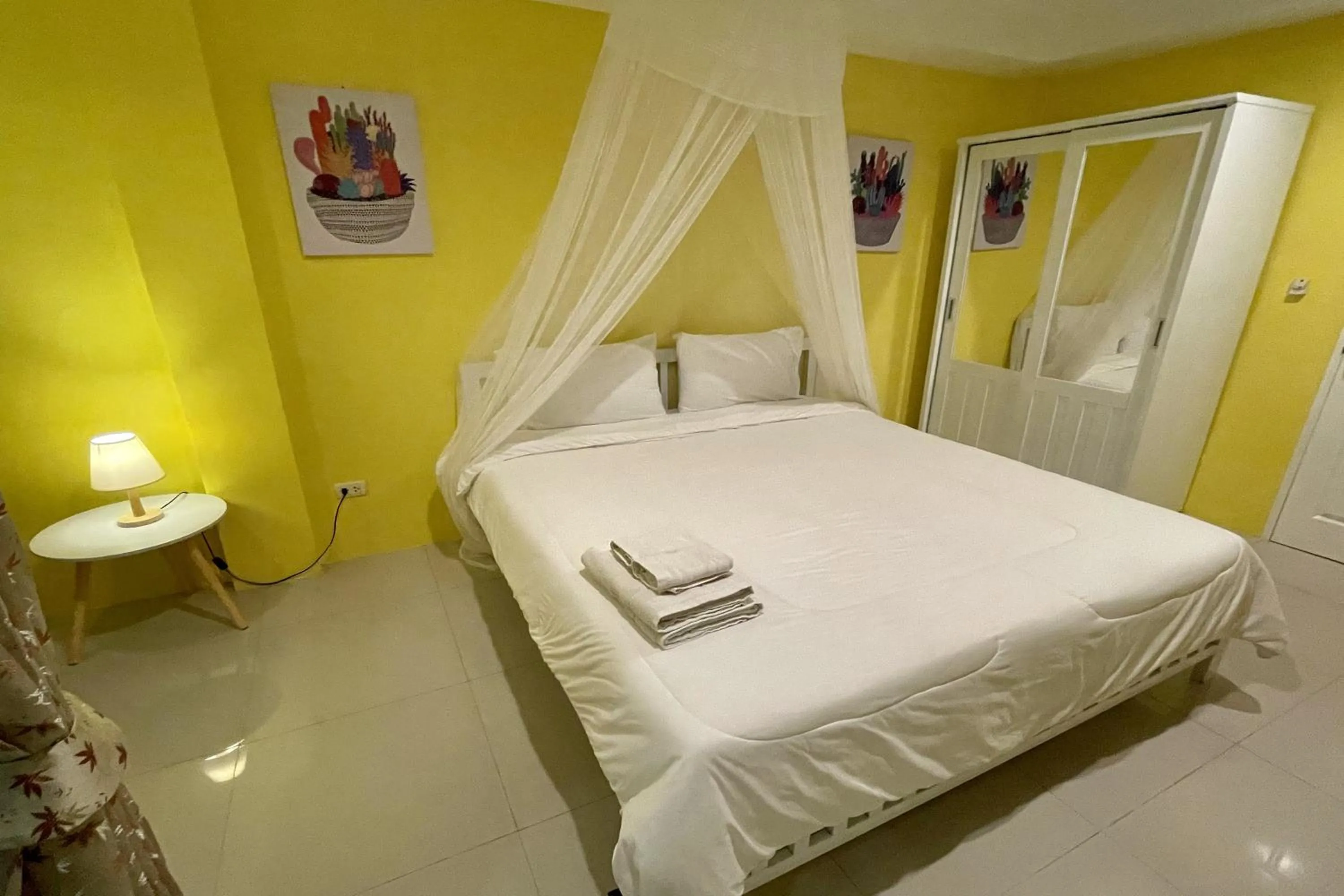 Bed in Be Rich Hotel