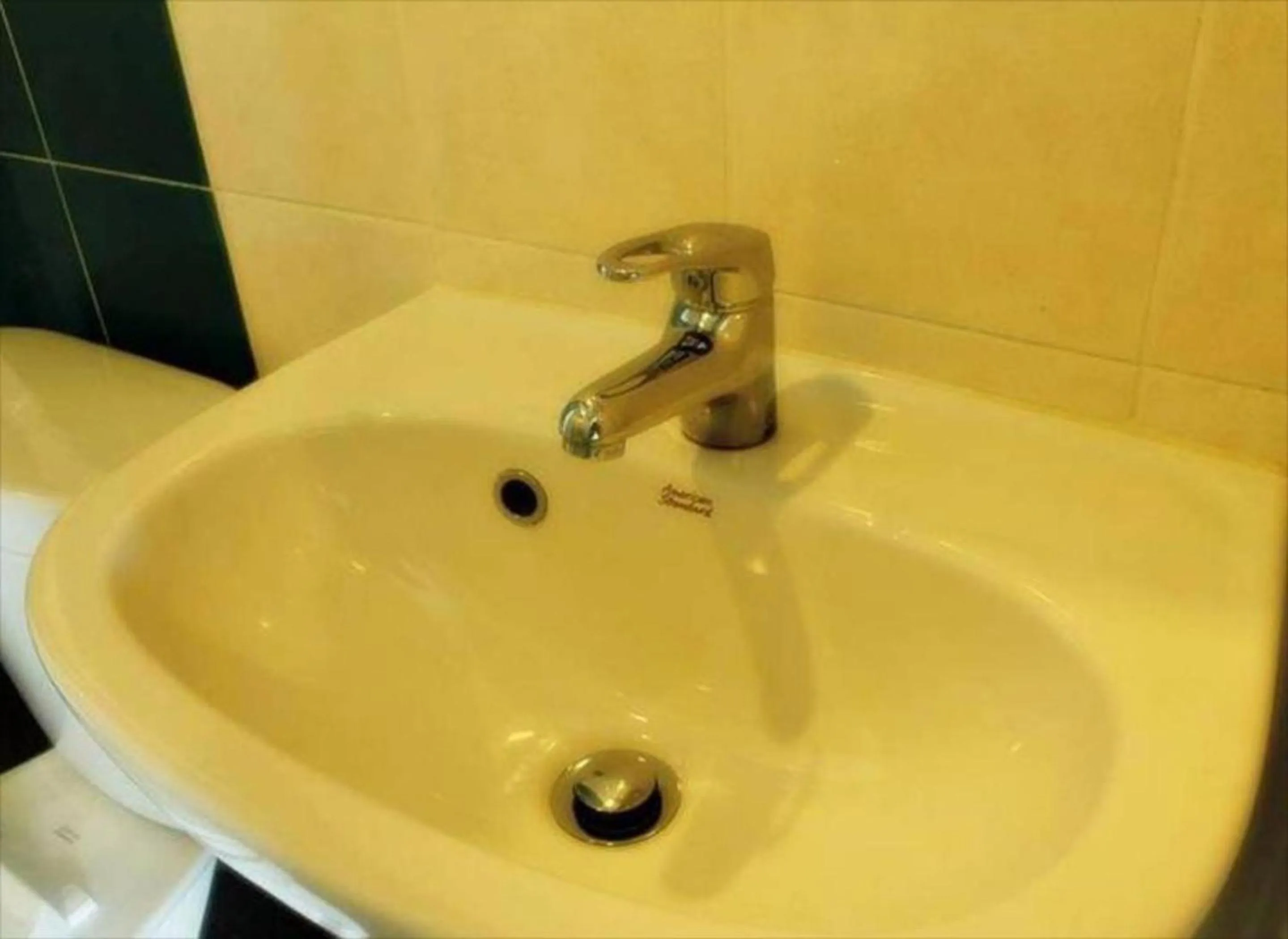 Bathroom in Be Rich Hotel