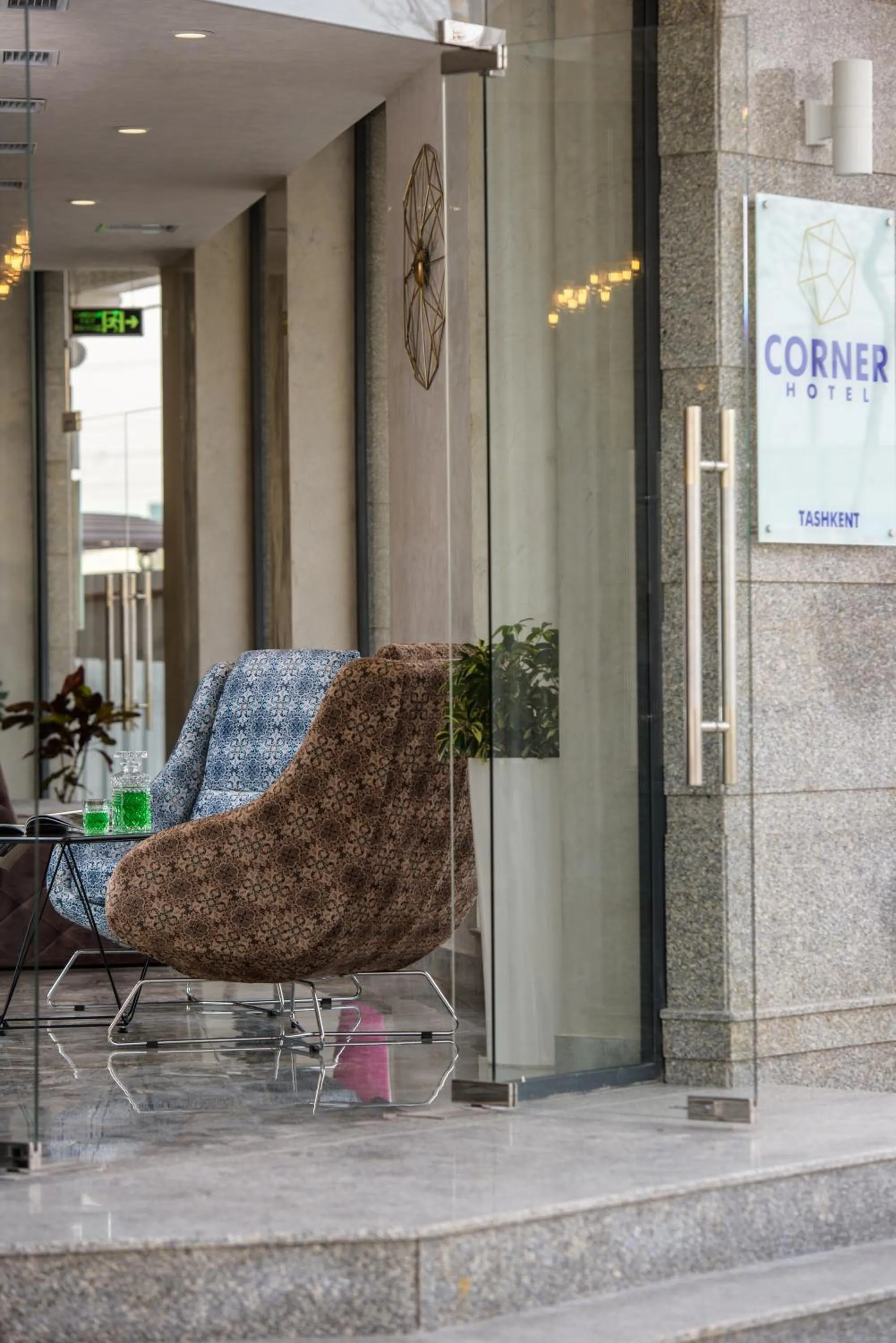 Property logo or sign in Corner Hotel Tashkent