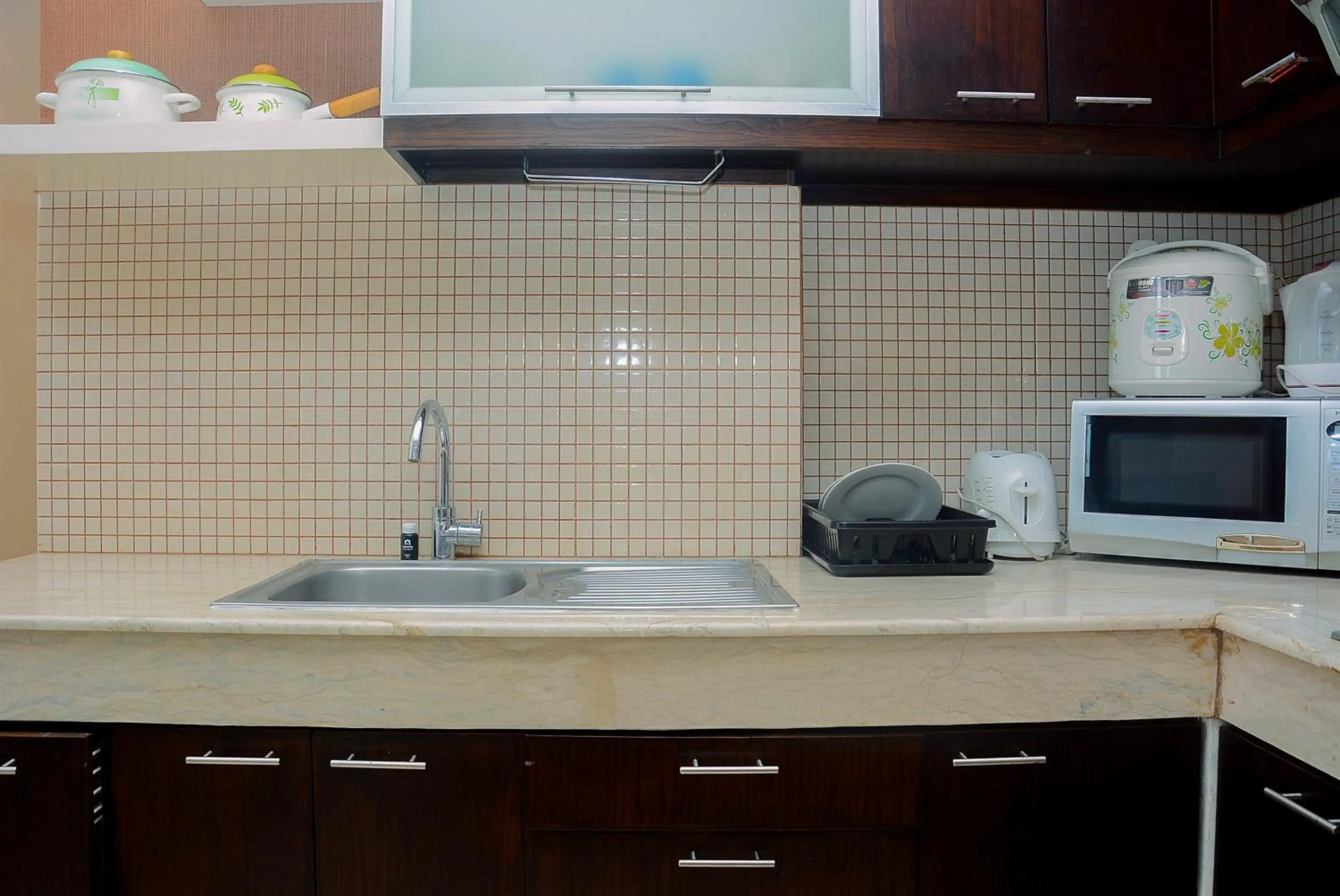Kitchen or kitchenette in Strategic Location 2BR Apartment at FX Residence By Travelio