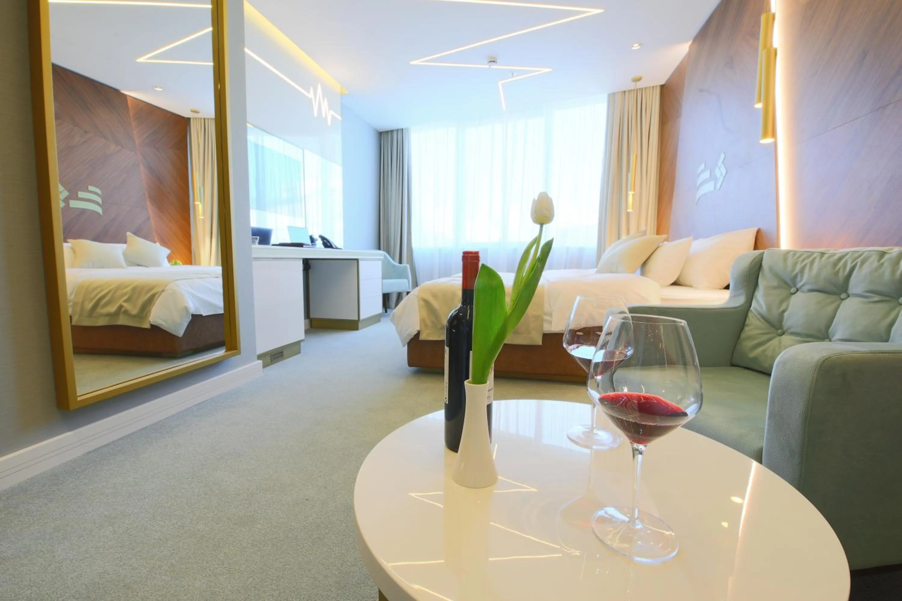 Seating area, Bed in Hotel Pupin Novi Sad