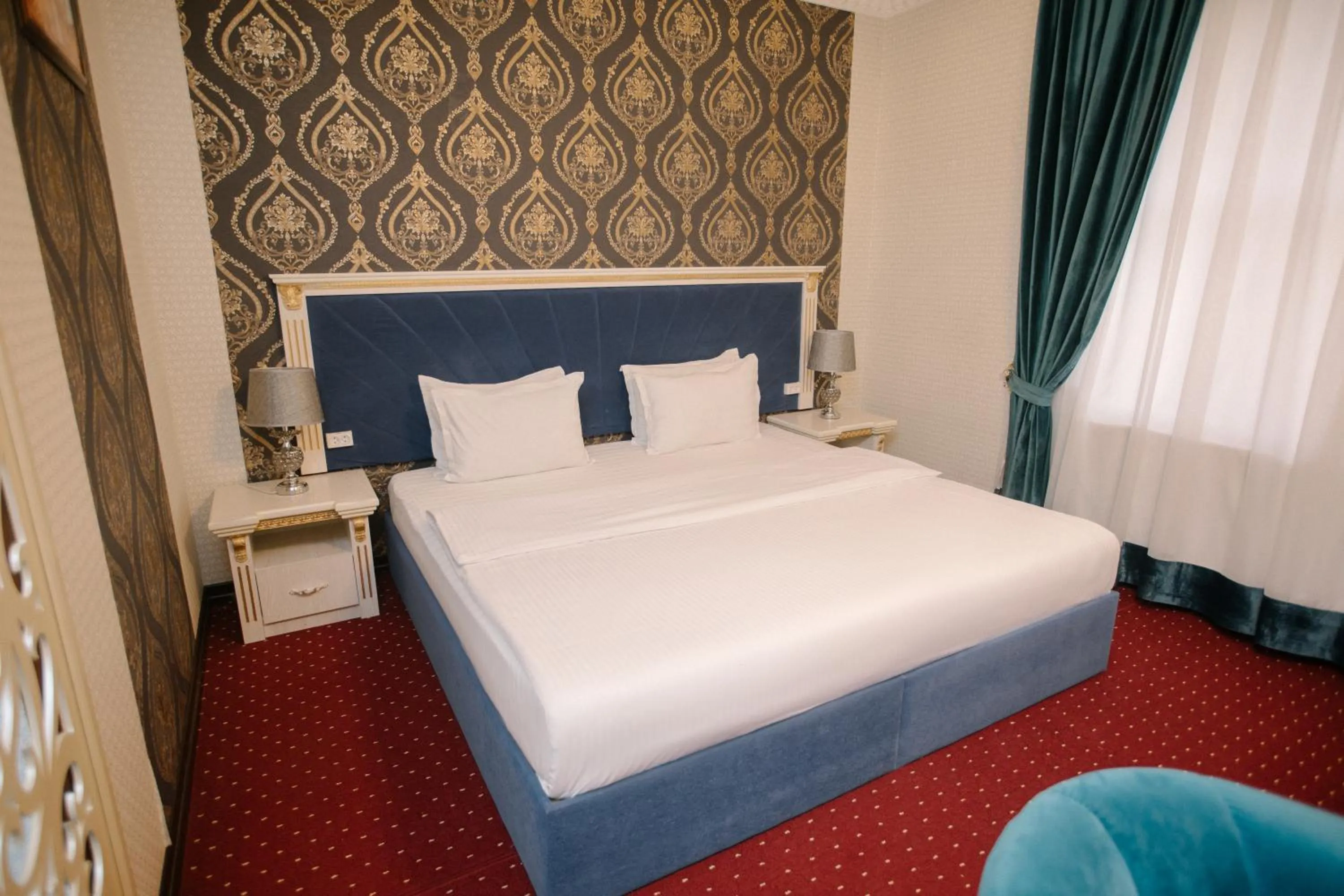 Bed in Dendi Plaza Hotel