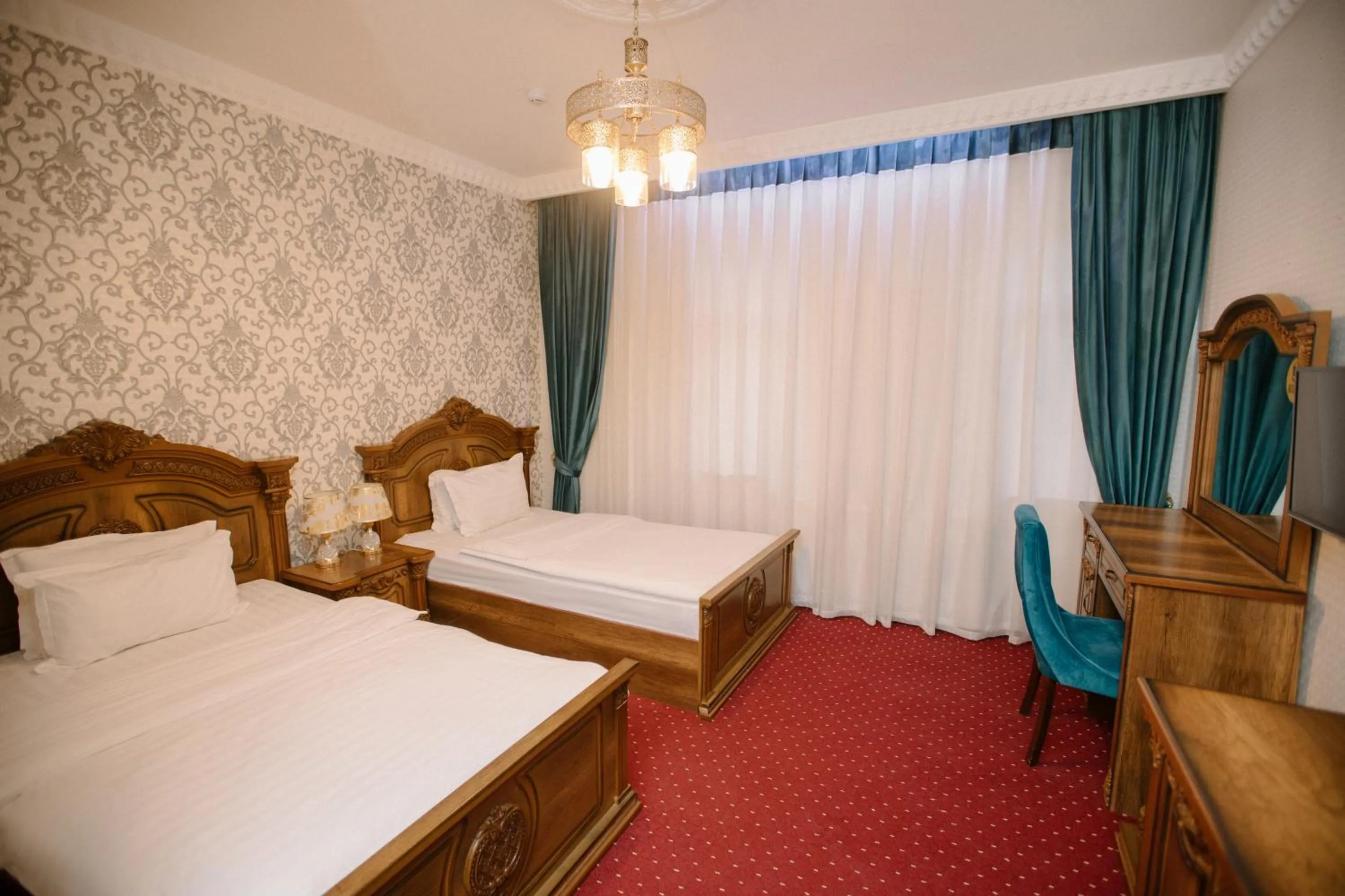 Bed in Dendi Plaza Hotel