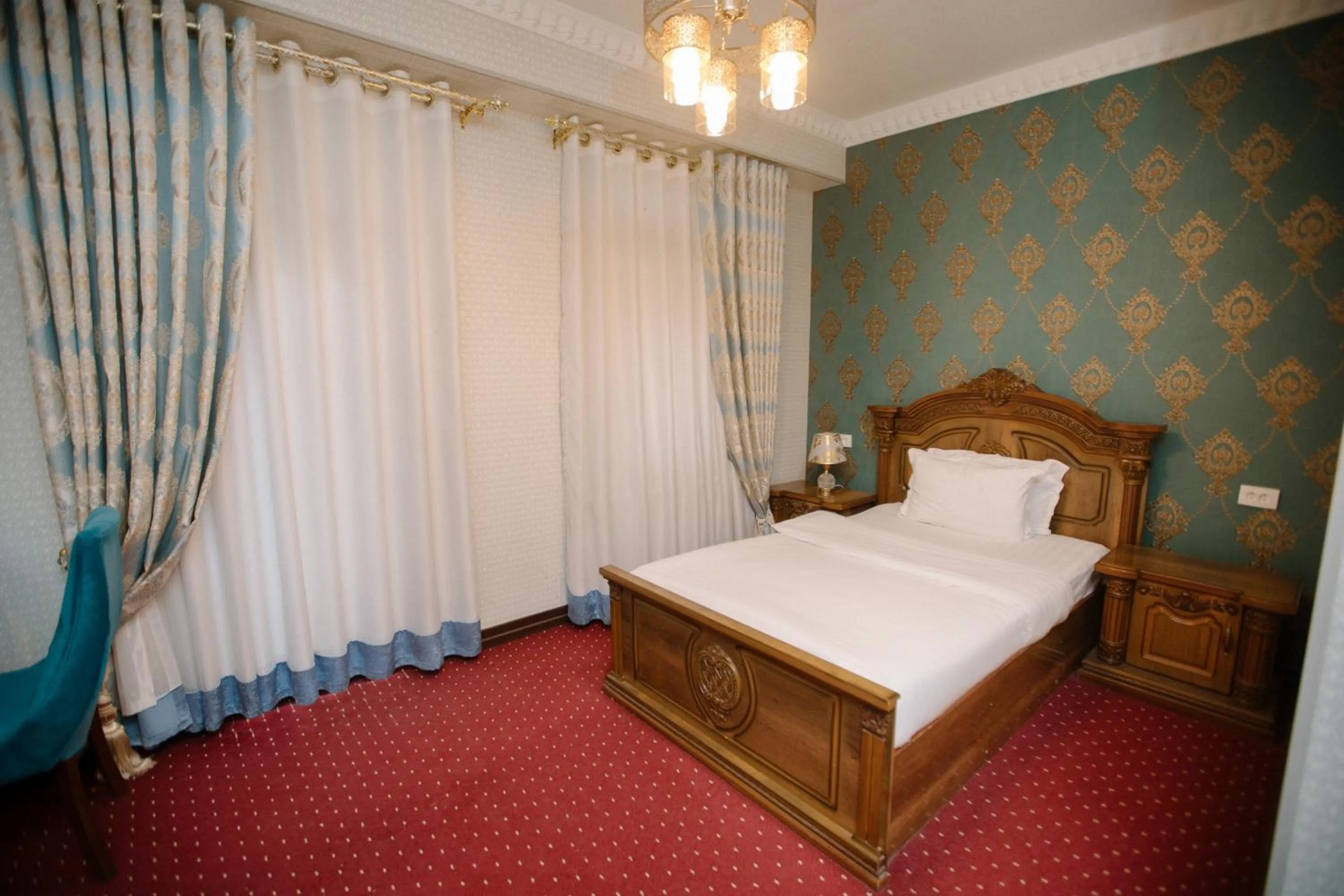 Bed in Dendi Plaza Hotel